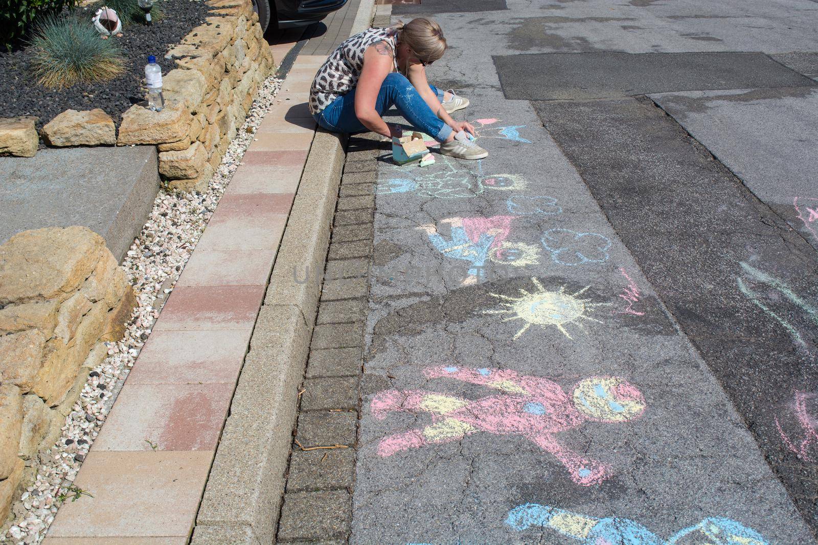 Chalk paintings on a street by JFsPic