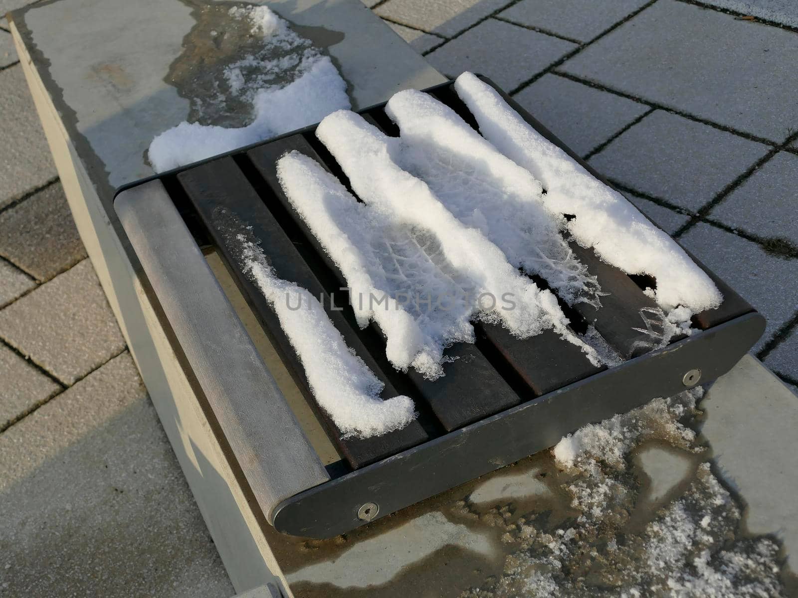 park bench with snow in Germany