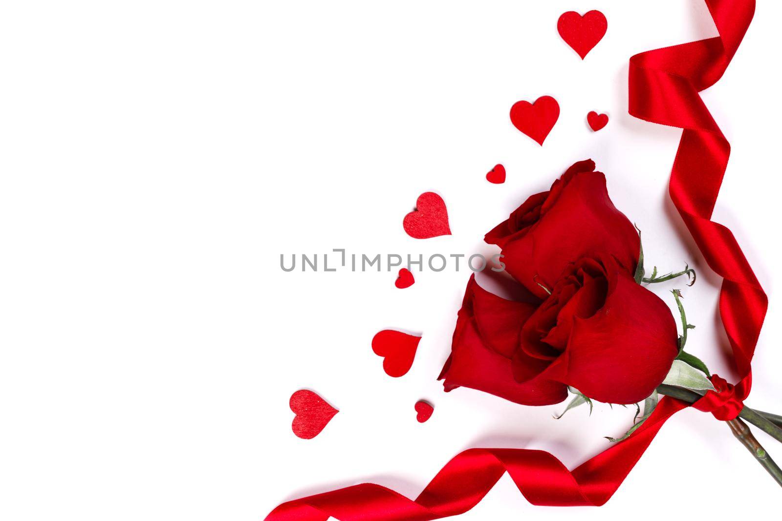 Valentines day hearts and red rose flowers isolated on white background