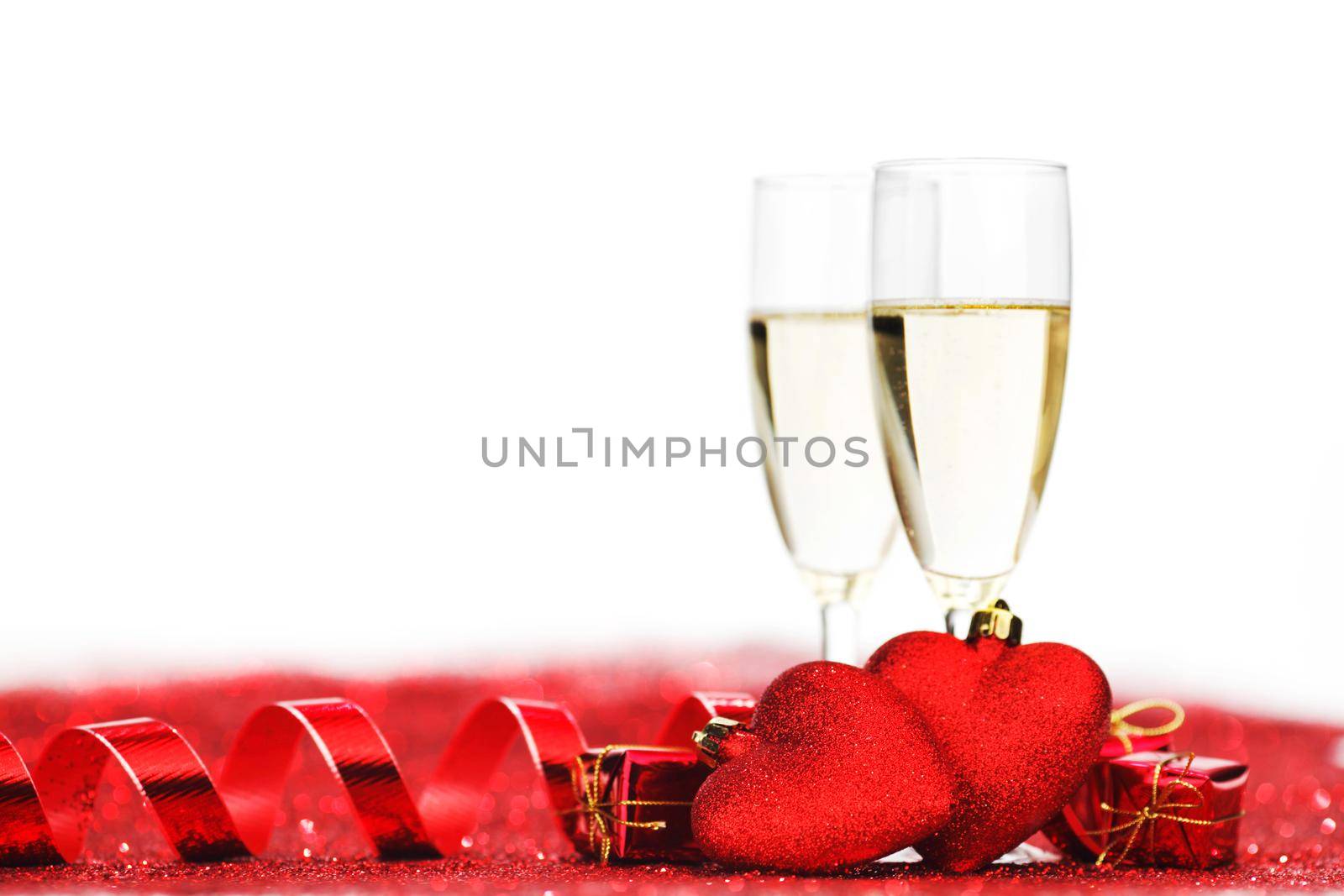 Two glasses of champagne with red decor, Valentines day concept