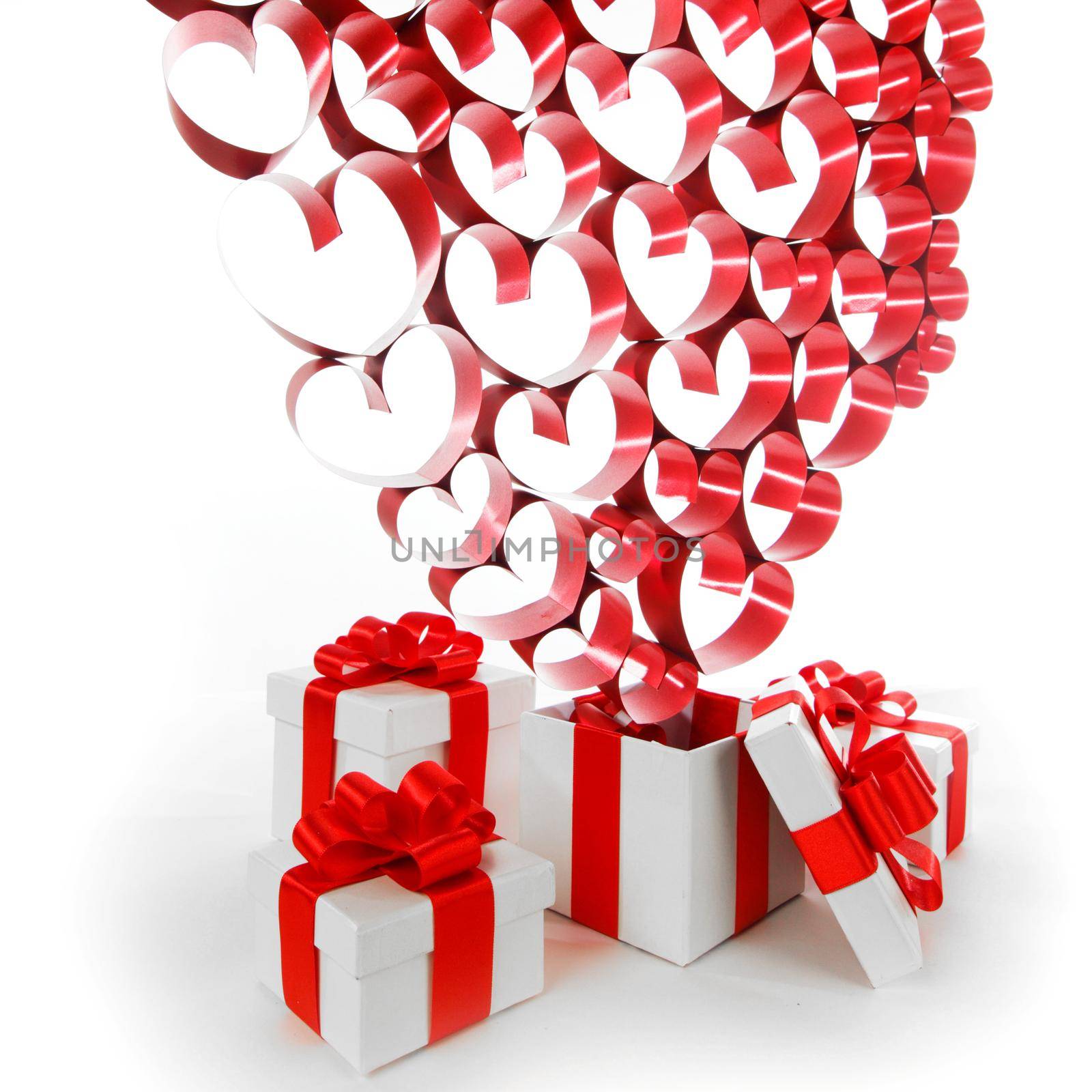 White boxes with red ribbons and decorative hearts isolated on white background, Valentine day