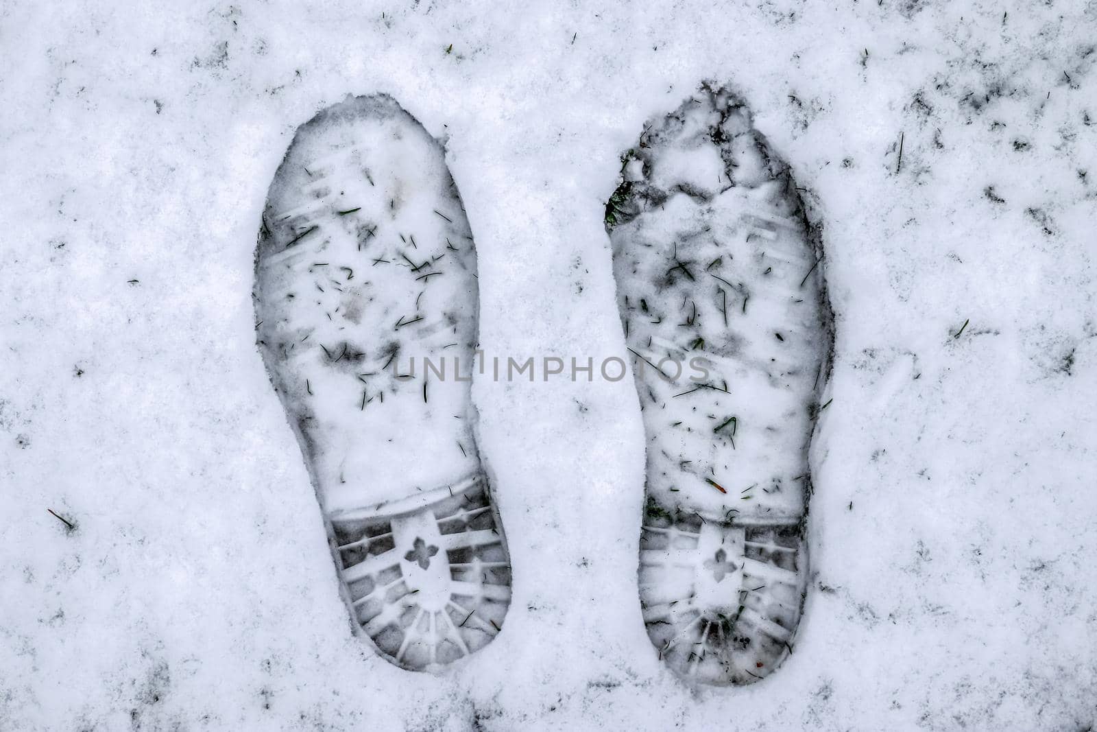 Footsteps of male shoes in fresh white snow in winter by MP_foto71