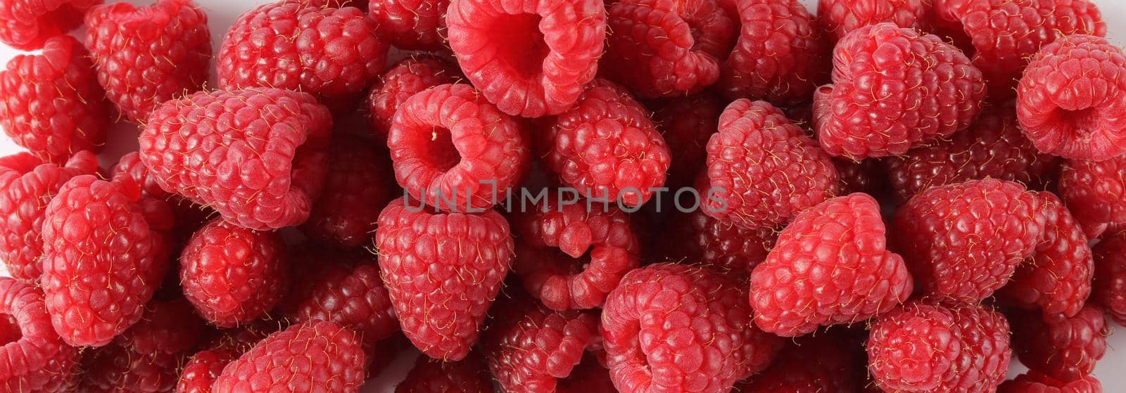 Fresh and sweet raspberries background by NelliPolk