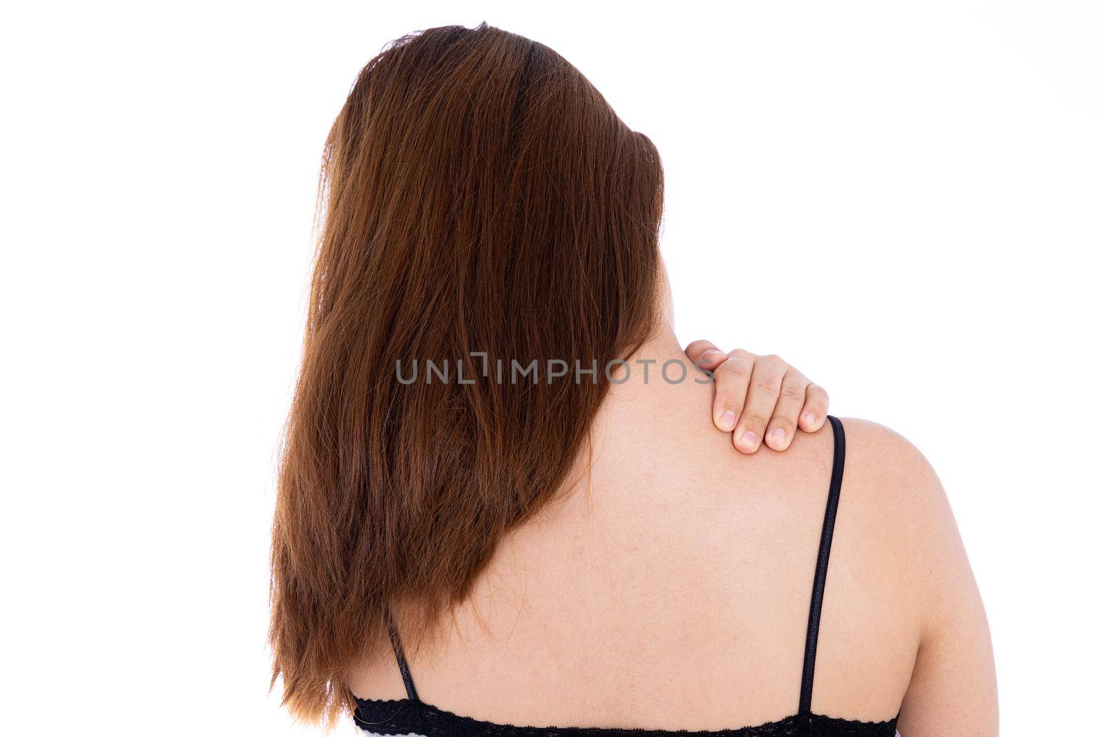 Woman suffering from neck and shoulder pain isolated white background. Health care and medical concept.