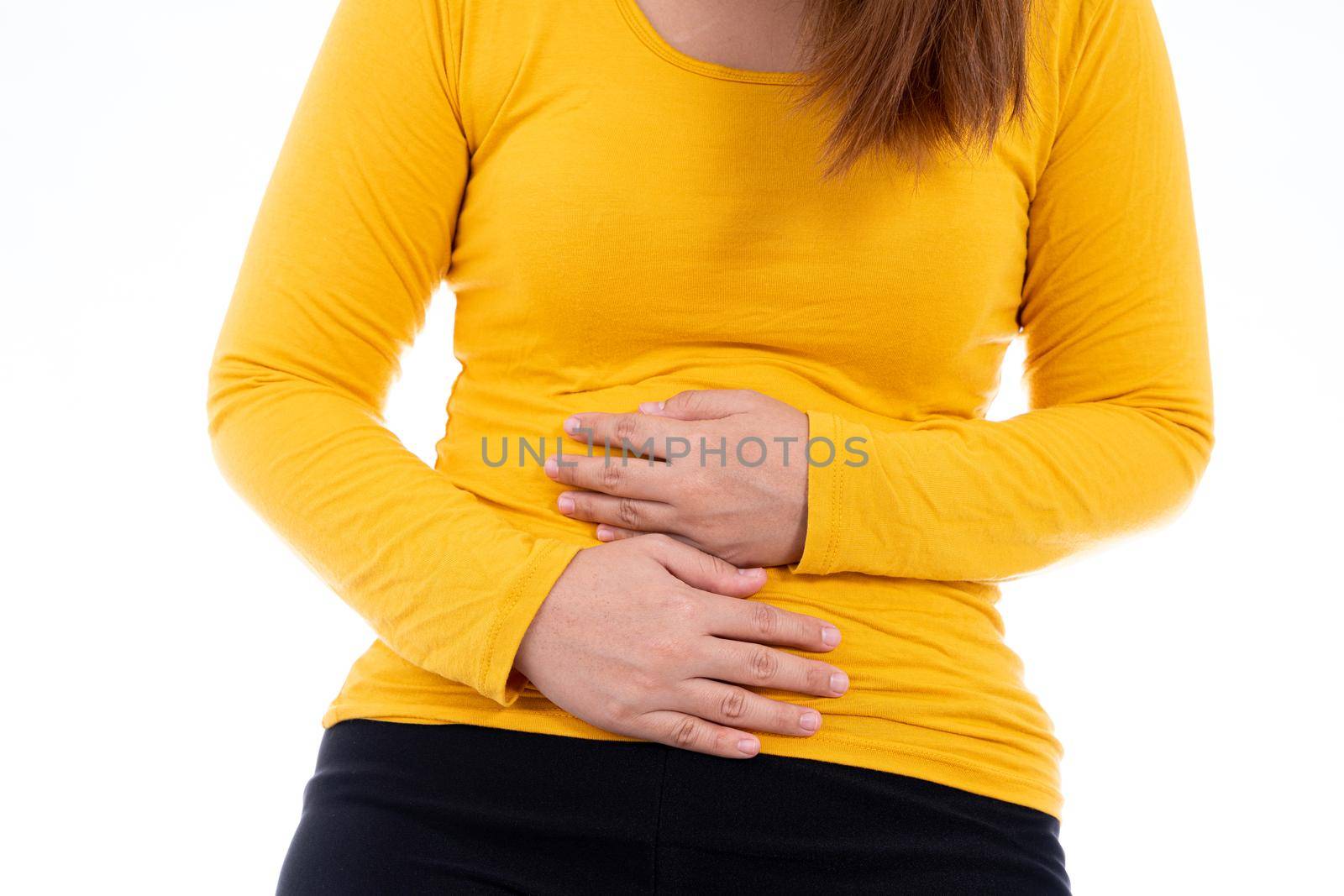 Woman suffering from stomach pain and injury isolated white background. Health care and medical concept.