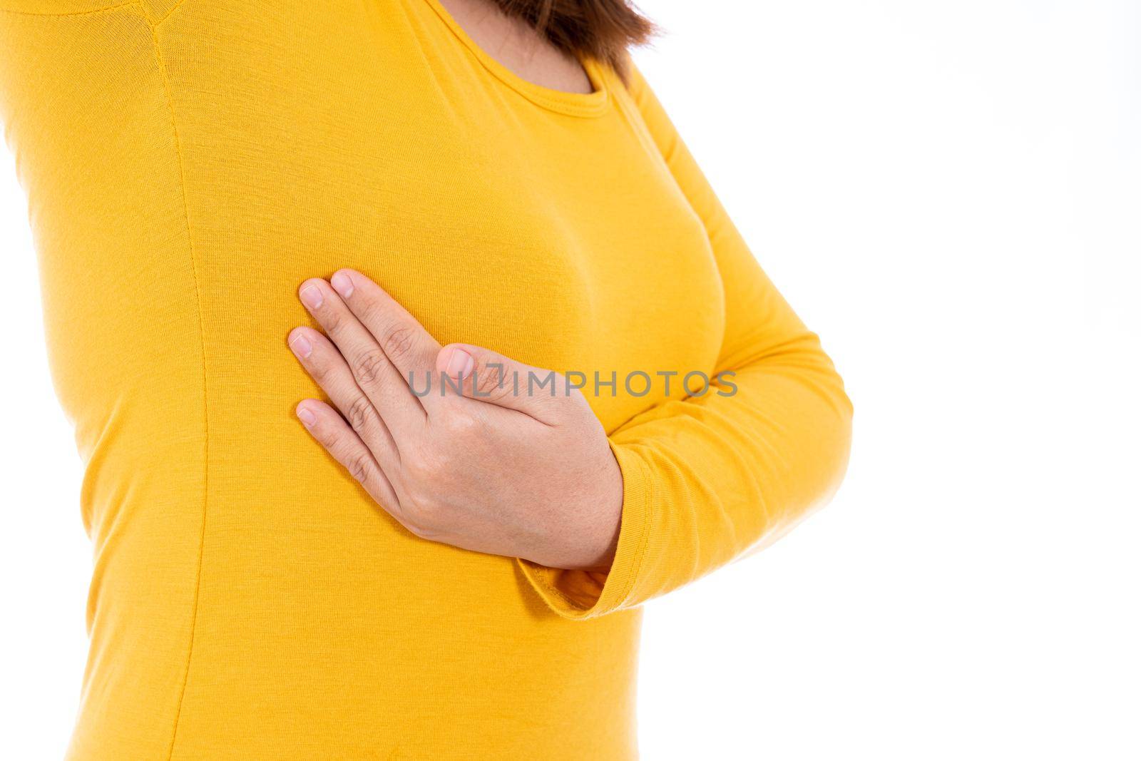 Woman hands doing breast self exam for checking lumps and signs of breast cancer isolated white background. Medical, healthcare for advertising concept.