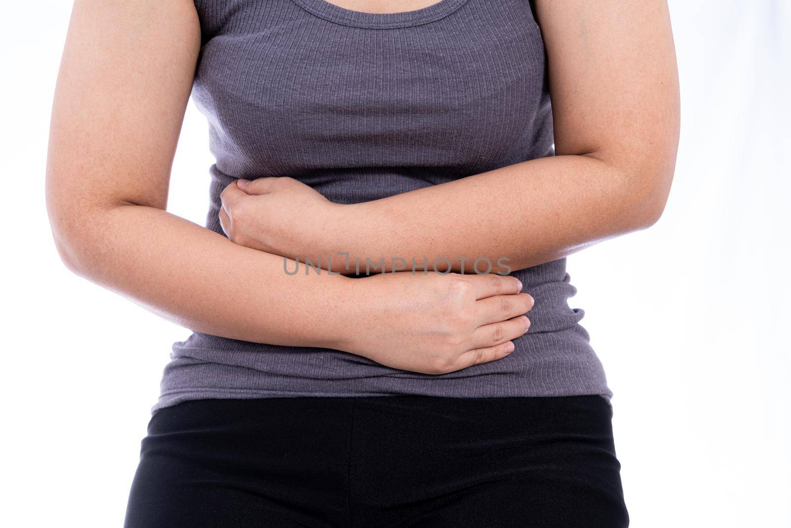 Woman suffering from stomach pain and injury isolated white background. Health care and medical concept.