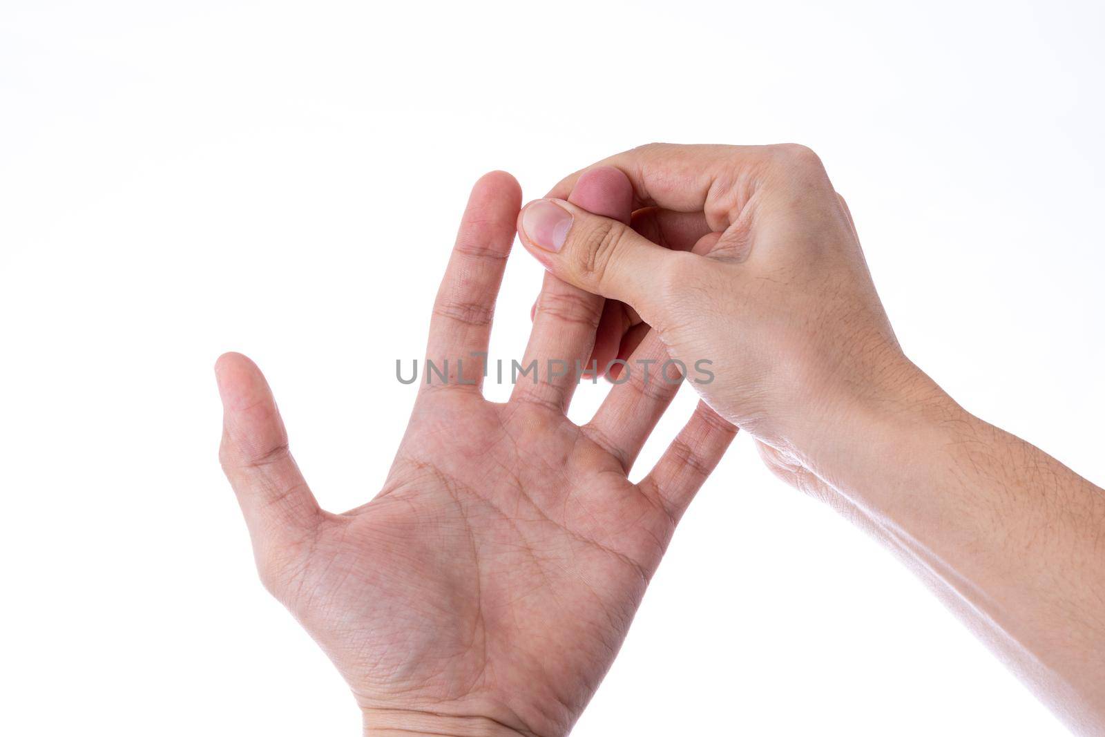 Man hand massaging his fingers isolated white background. Medical, healthcare for advertising concept.