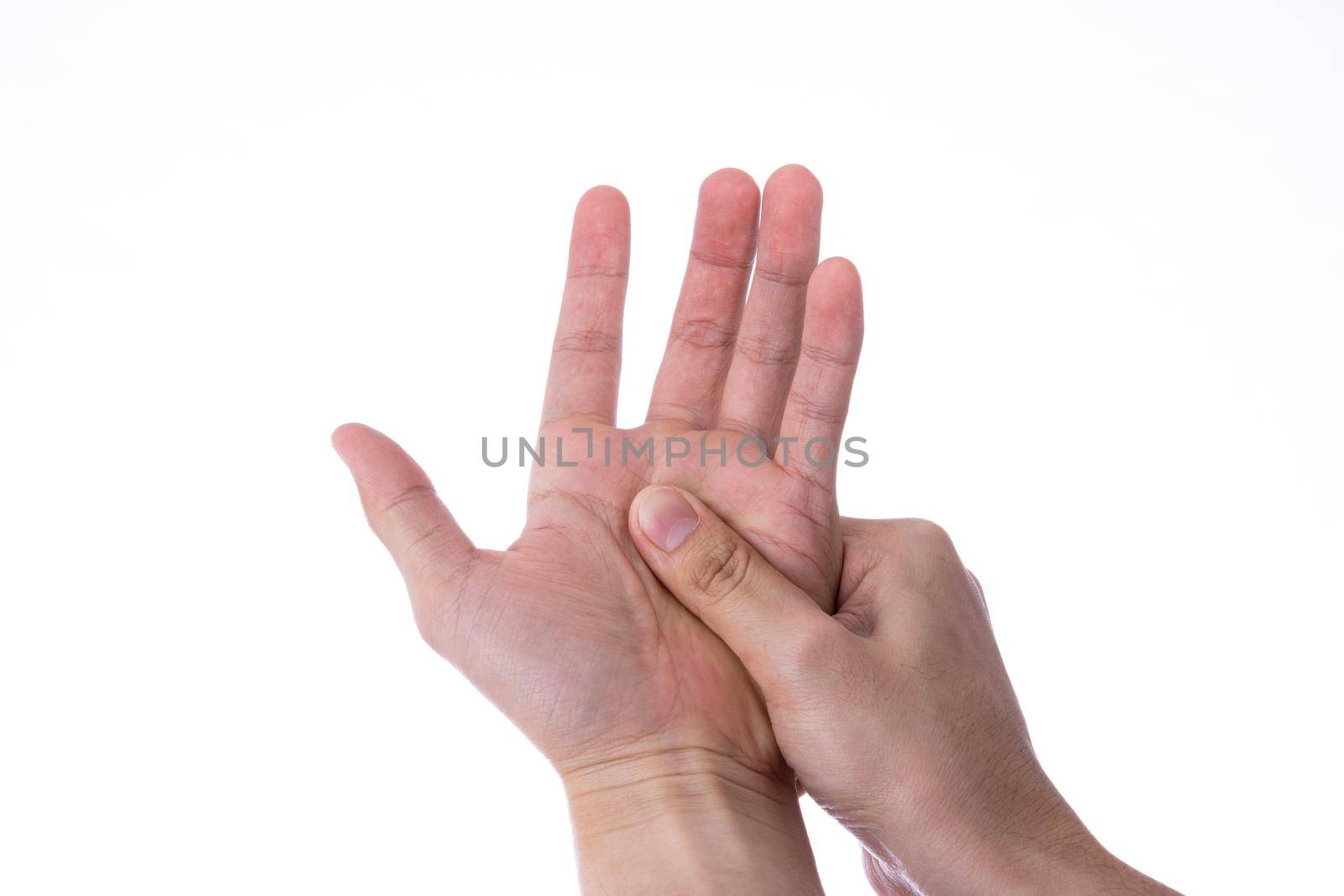 Man hand massaging his hand isolated white background. Medical, healthcare for advertising concept. by mikesaran