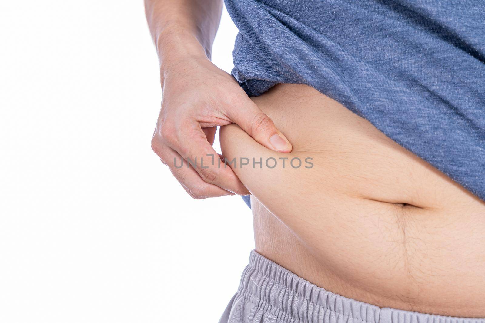 Fat man holding excessive fat belly, overweight fatty belly isolated white background. Diet lifestyle, weight loss, stomach muscle, healthy concept.