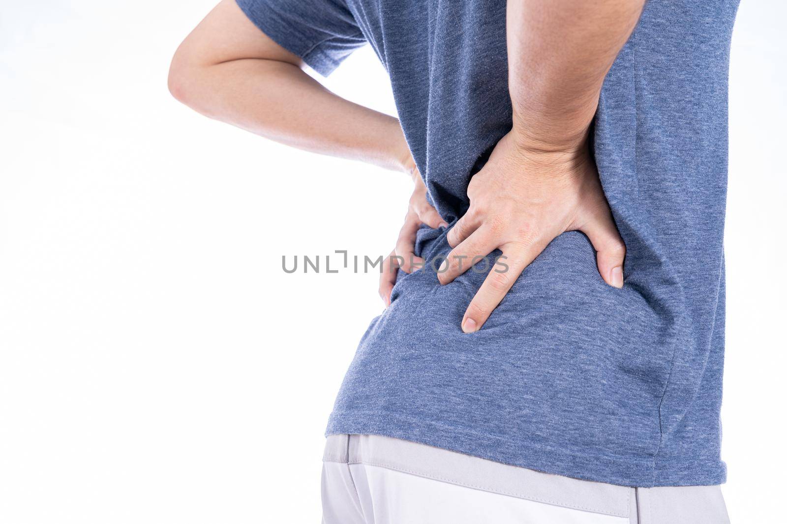 Man suffering from waist and back pain isolated white background. Health care and medical concept. by mikesaran