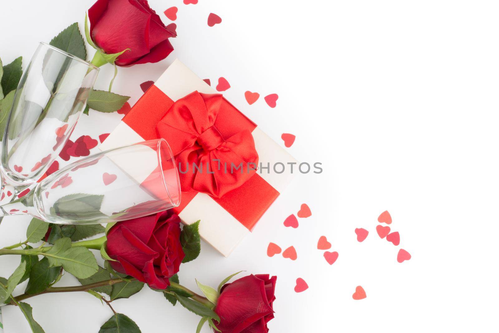 Valentine day gift rose flowers hearts and glasses on white romance love concept