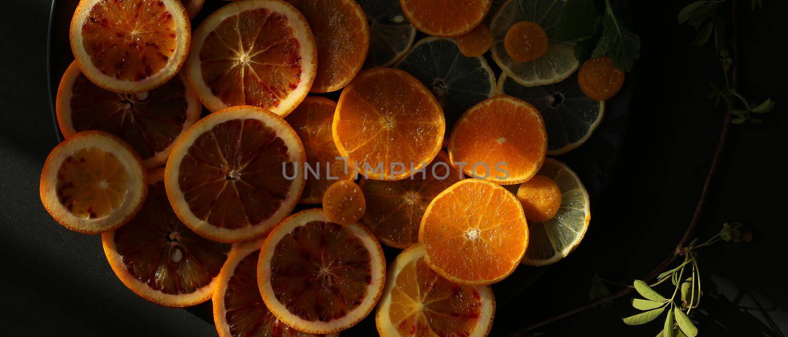 Citrus fruits collection. Artistic dramatic food background