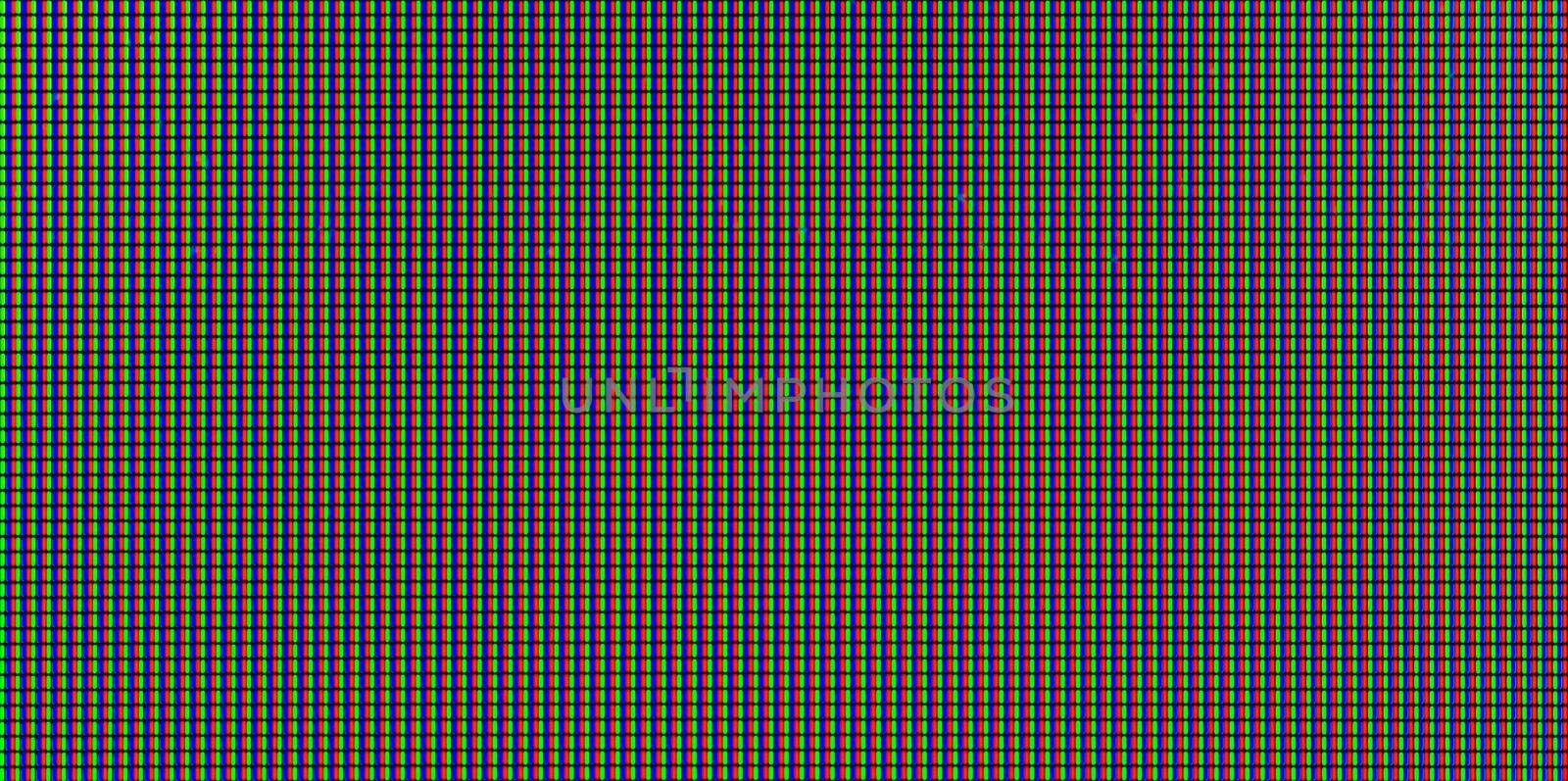 Macro shot of LCD computer screen displaying pure white, RGB pixels texture or background.