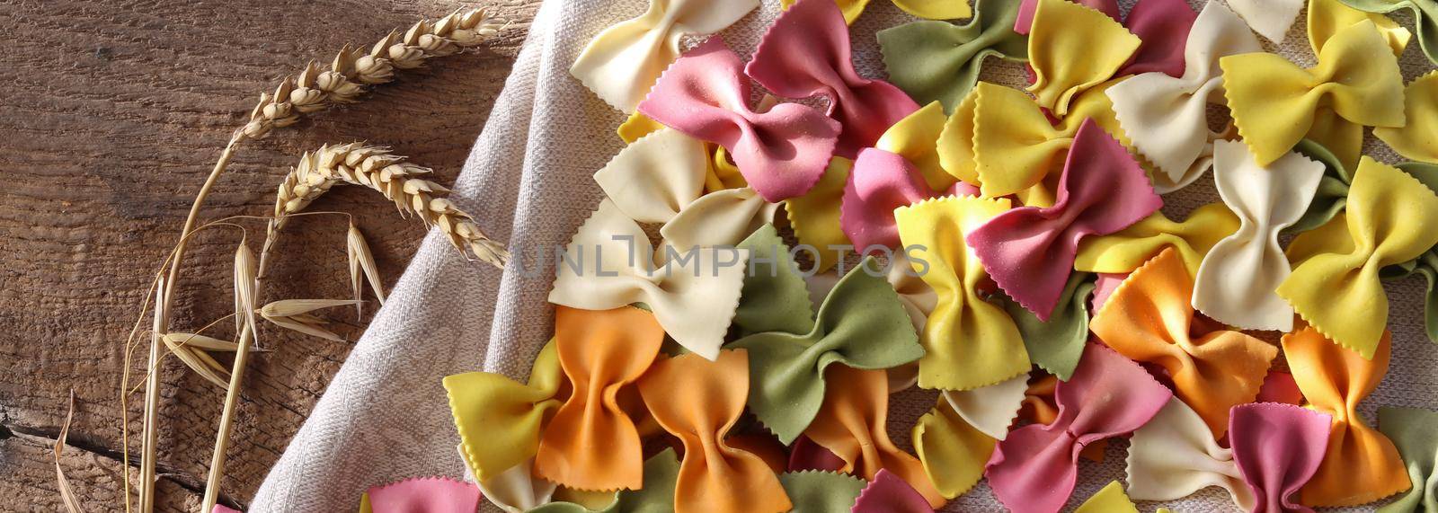 colourful background with raw pasta by NelliPolk