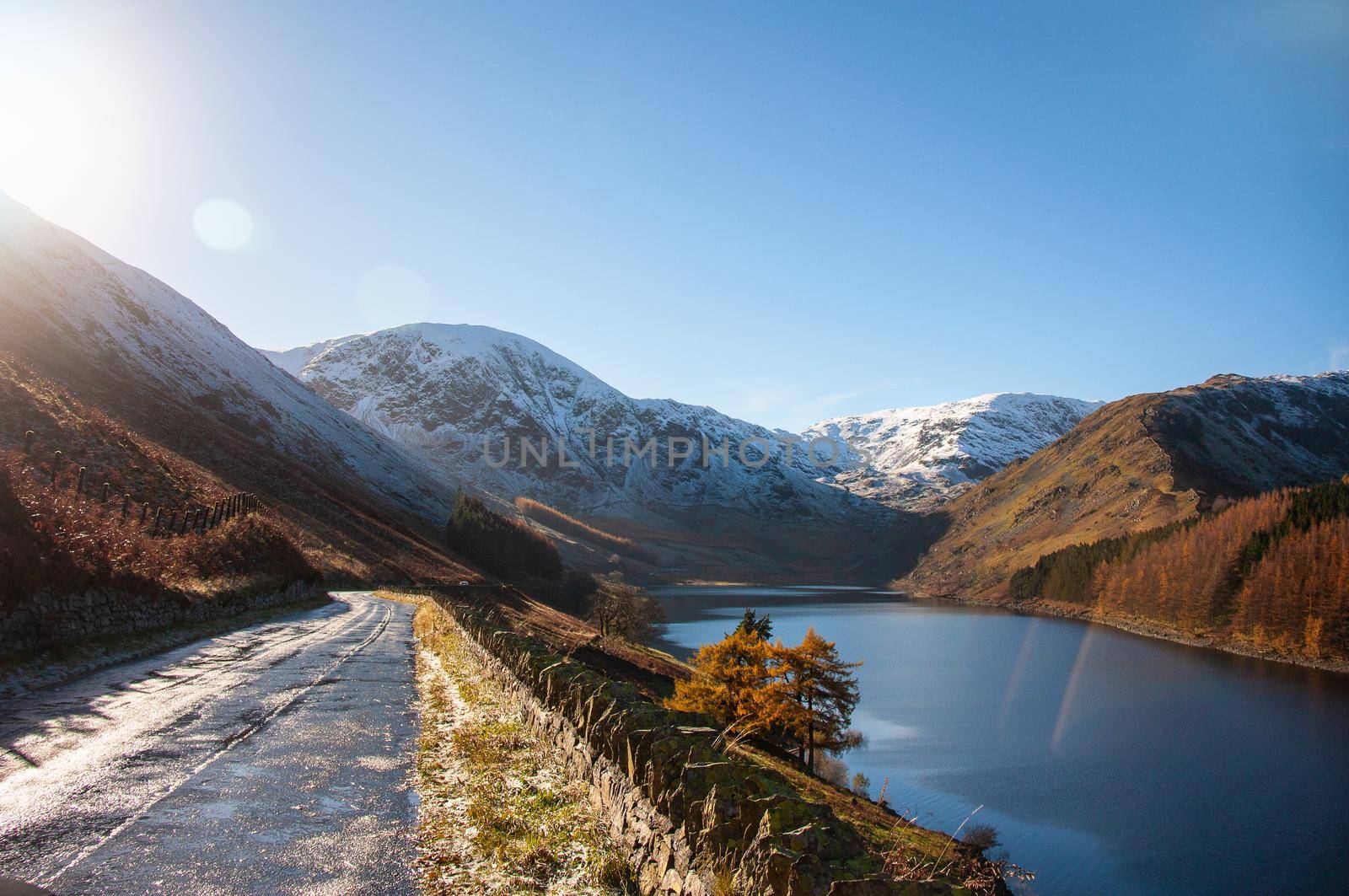 Mounting winter landscape. Sun, snow, mounting Lake District UK during winter day