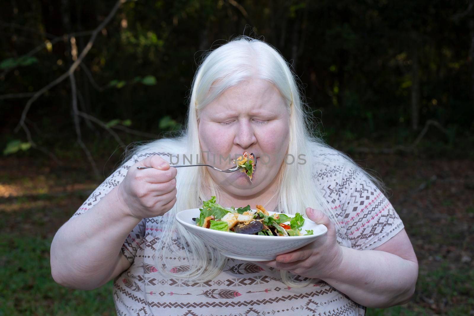 Woman Eating a Salad by tornado98