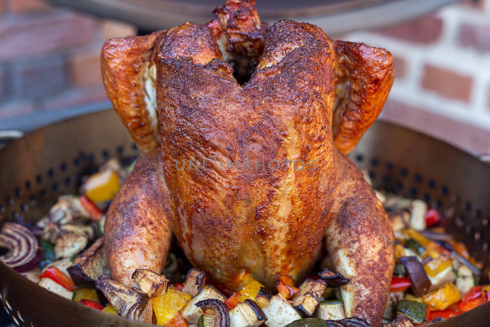 Rubbed Beer can chicken on barbecue with smoked veggies by mlechanteur