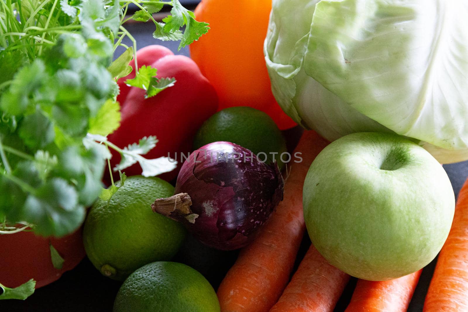 Composition with vegetables and fruit unions, apple, carrot, lemon, orange, bell peppers by mlechanteur