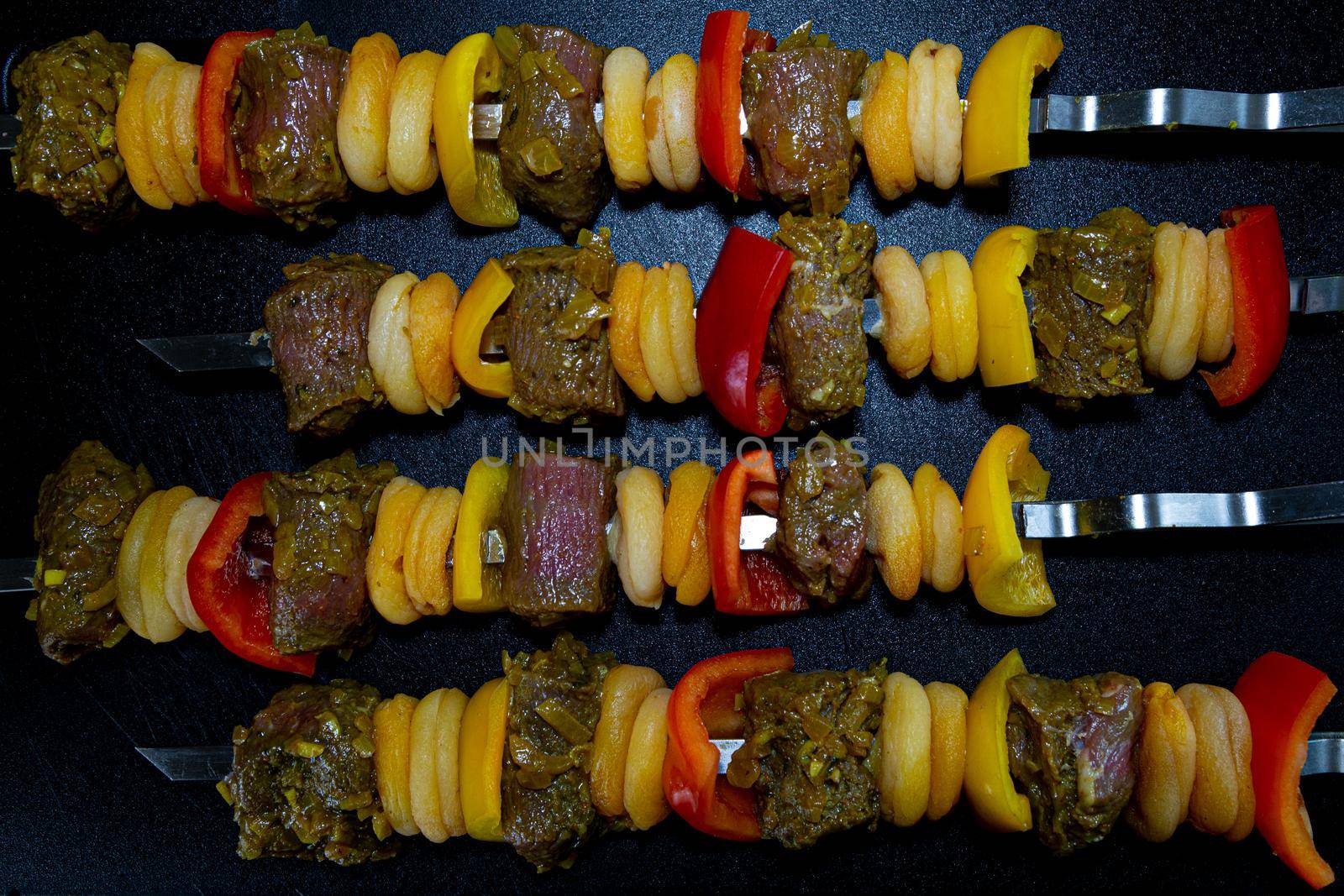 South African fillet of lamb with bell peppers and apricots on a skewer by mlechanteur