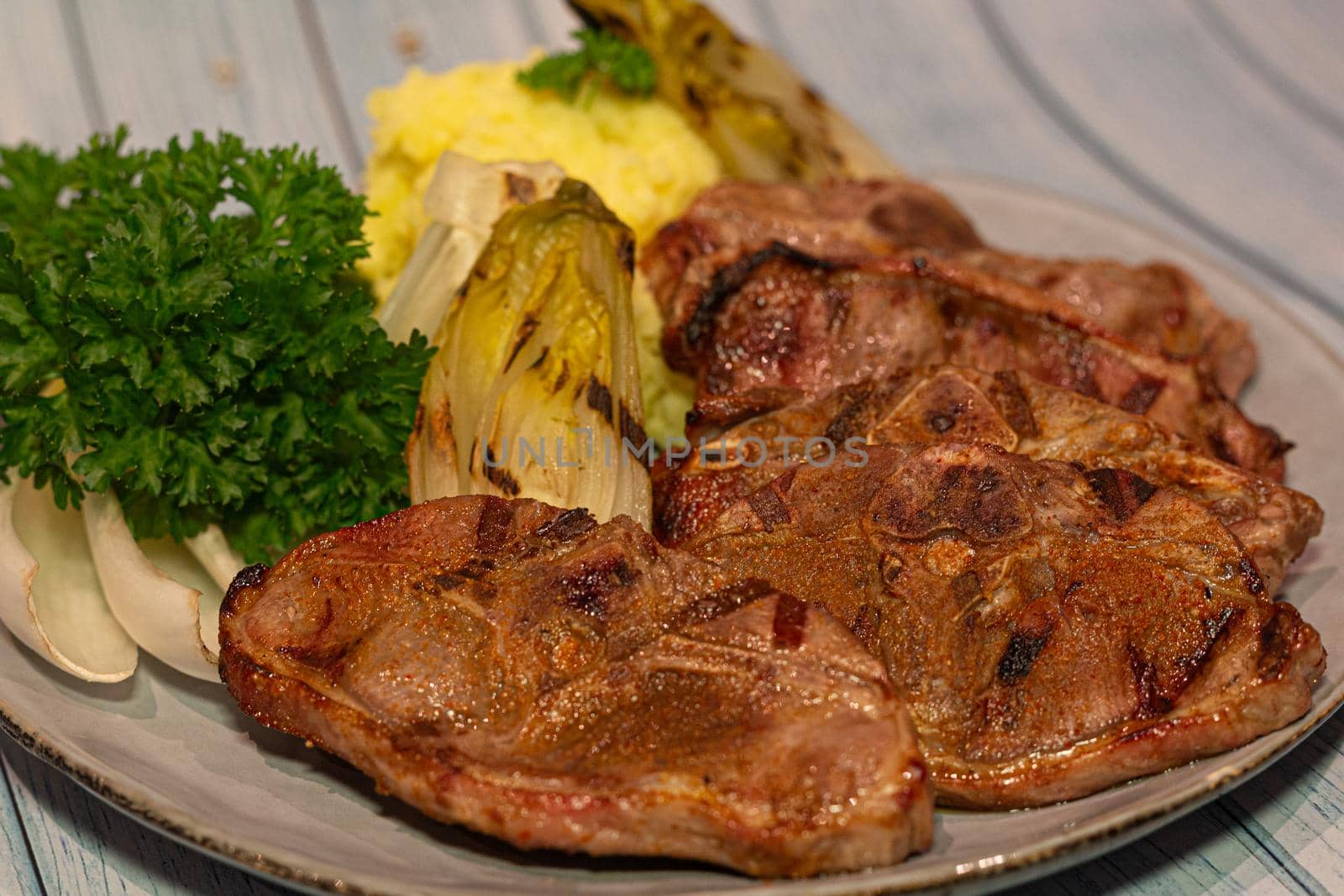 African Lamb chops with chicory and mashed potatoes