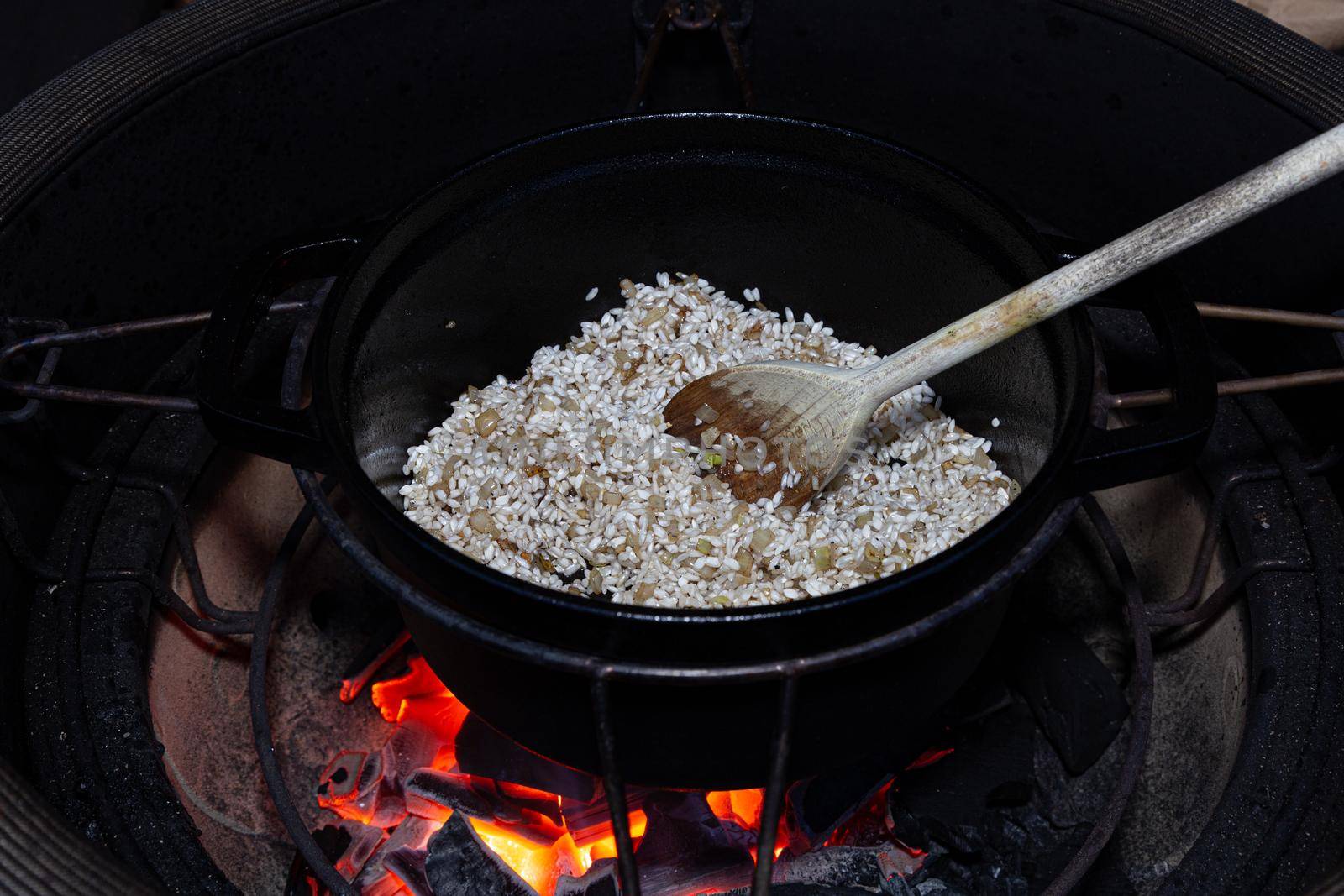 Making truffle risotto on barbecue in dutch oven by mlechanteur