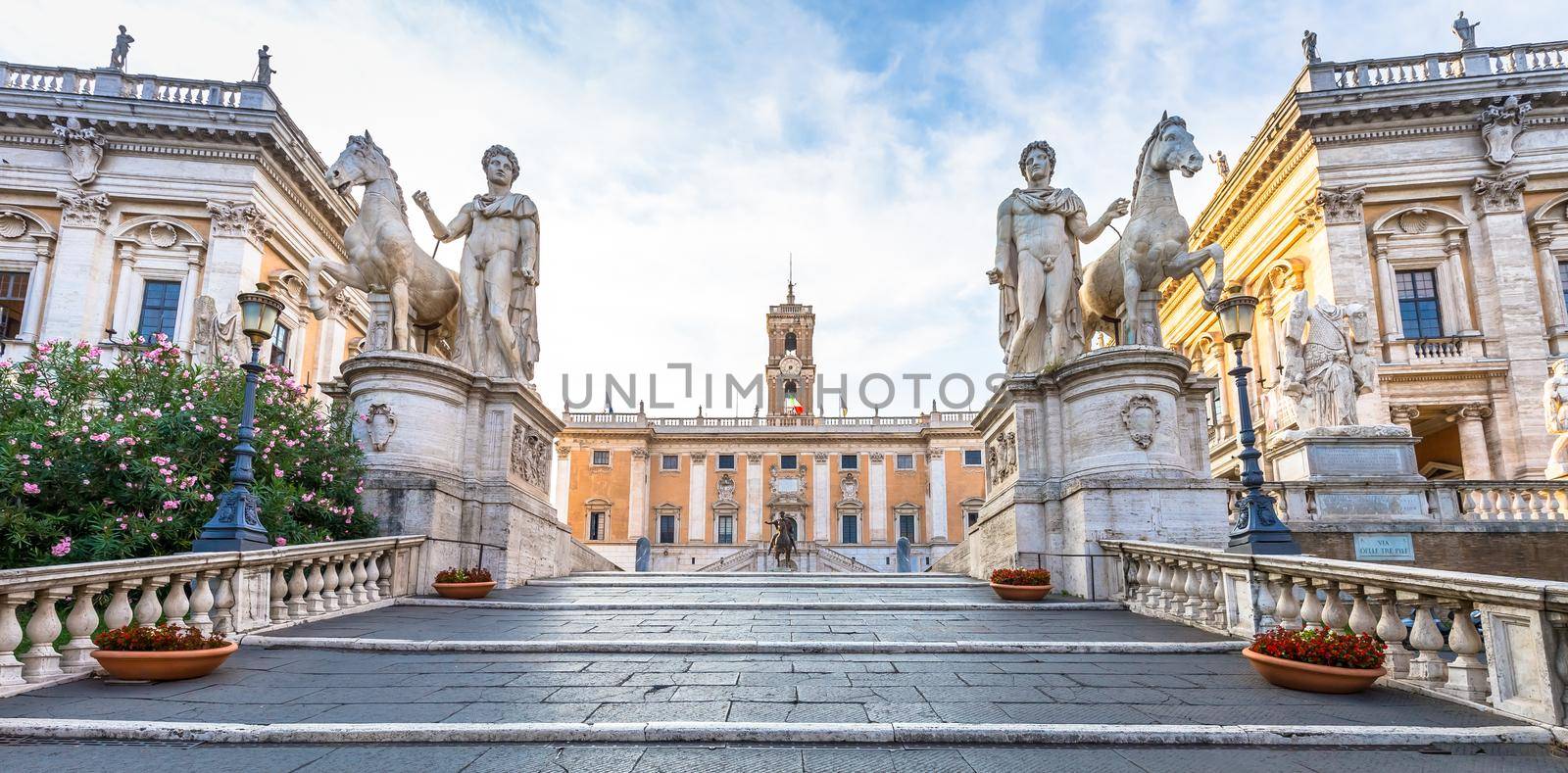 ROME, ITALY - CIRCA AUGUST 2020: staircase to Capitolium Square (Piazza del Campidoglio). Made by Michelangelo, it is home of Rome (Roma) City Hall. Sunrise light, before turist arrival.