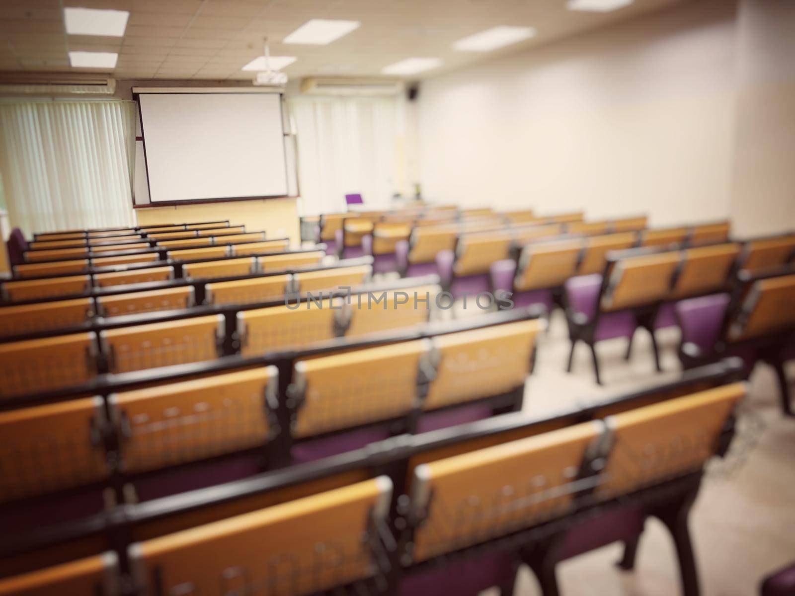 Empty classroom, college lecture hall  preparing for education in university, conference room before meeting. Business meeting room or Board room interiors. vintage tone.