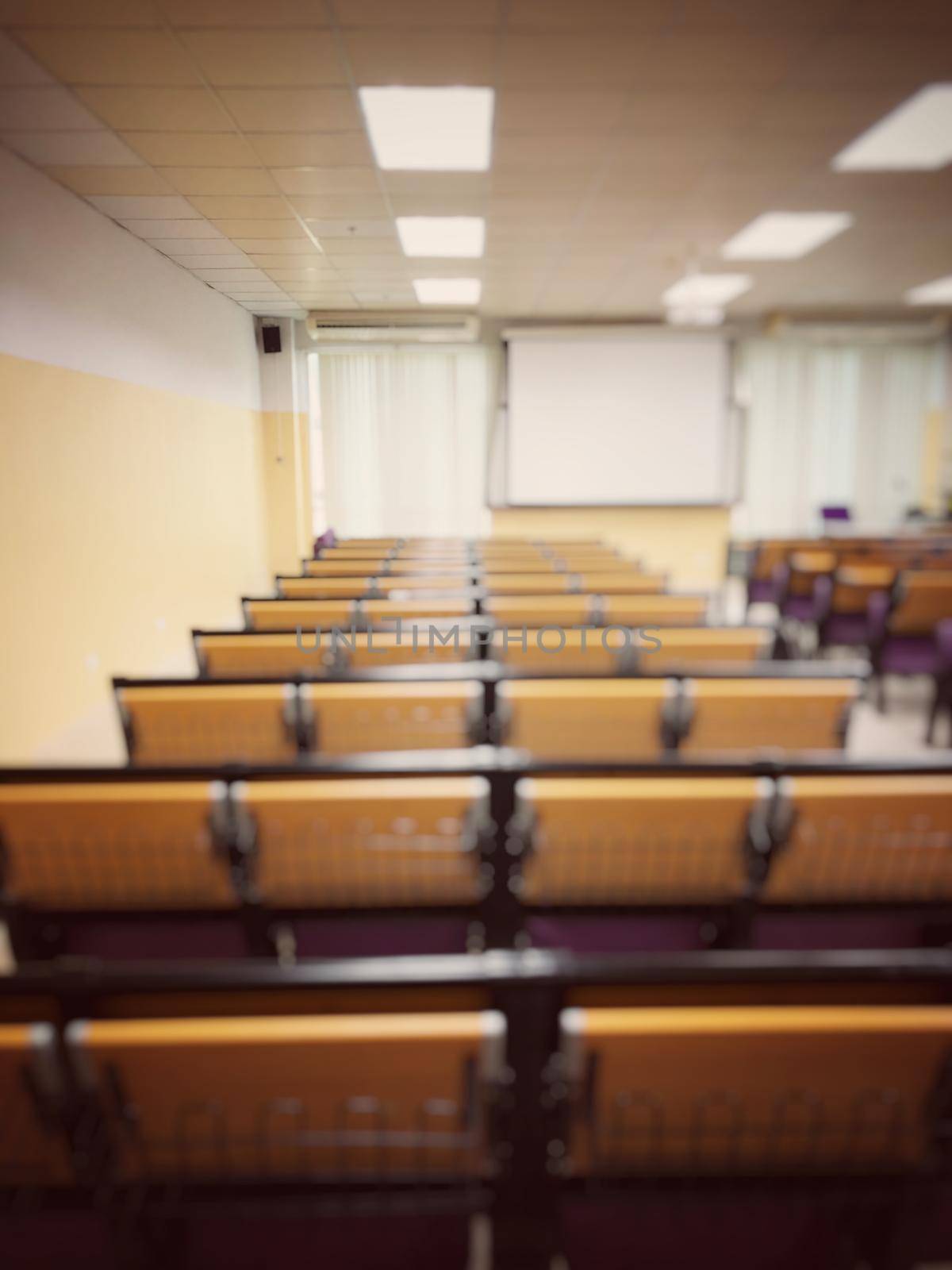 Empty classroom, college lecture hall  preparing for education in university, conference room before meeting. Business meeting room or Board room interiors. vintage tone. by NarinNonthamand