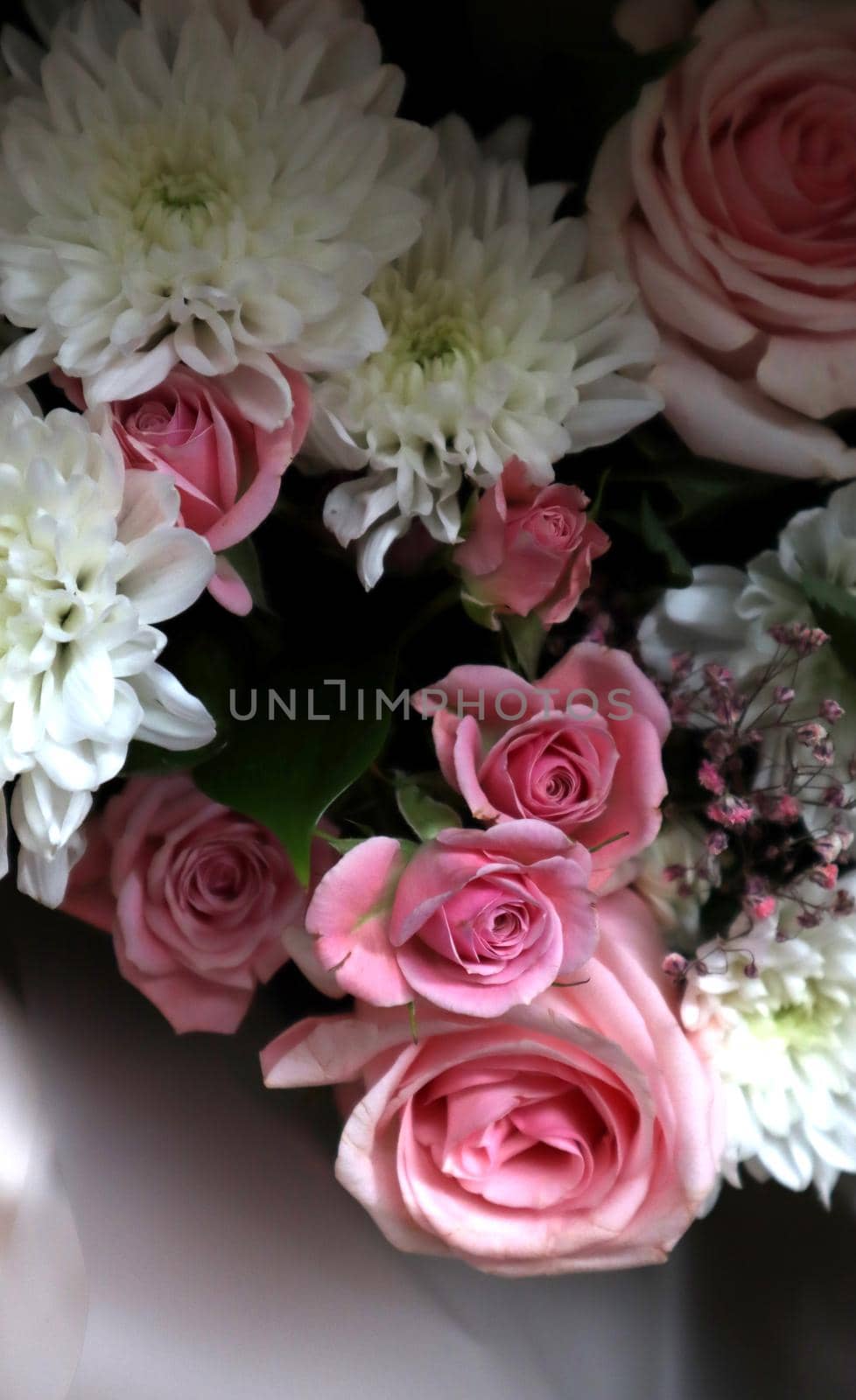 Bouquet of pink roses and white chrysanthemums