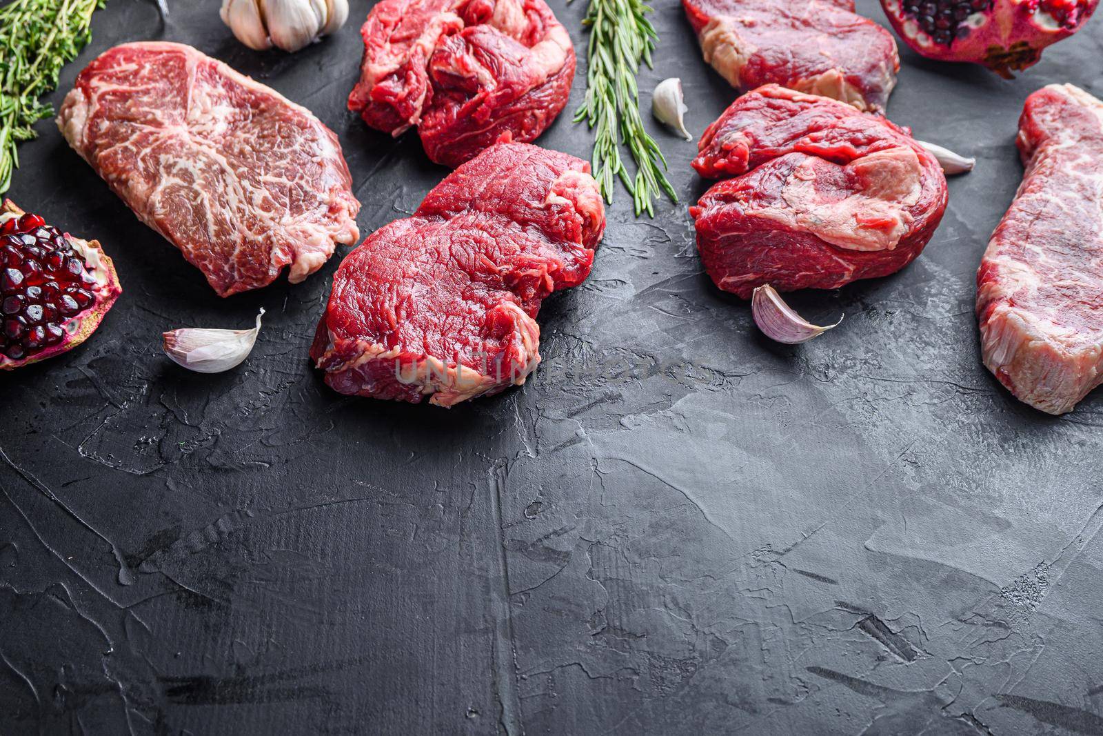 Alternative beef steak cuts with top blade, chuck roll and rump steak, side view with space for text