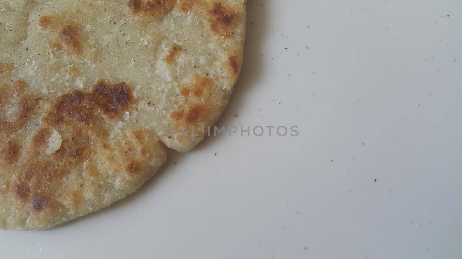 Closeup view of of traditional home made bread called Jawar roti or bhakri by Photochowk