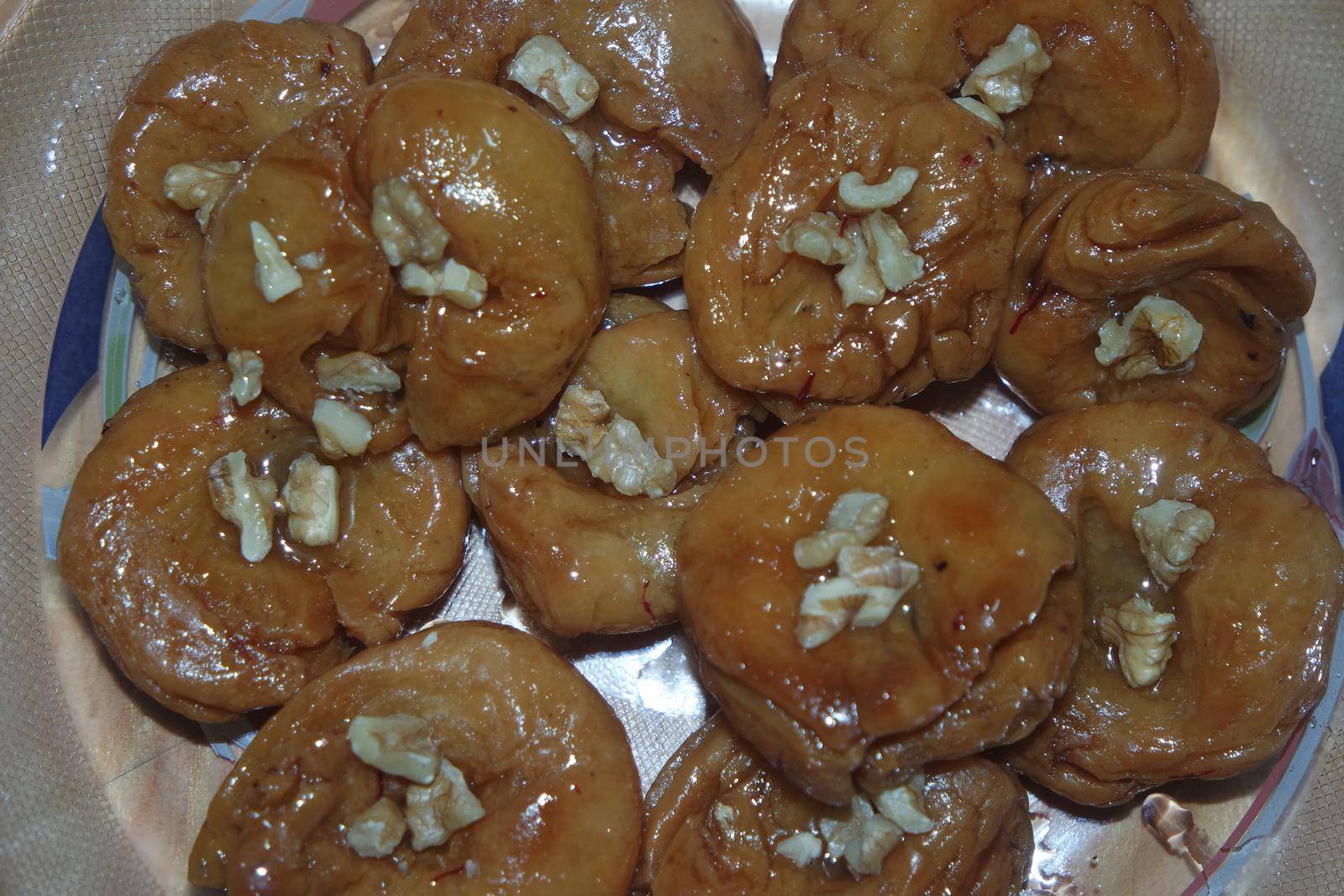 Closeup of delicious and tasty Asian sweet dish called balu shahi or baloshahi or balushahi. This dish is street sweet found in Pakistan India and Bangladesh and served in the festivities.