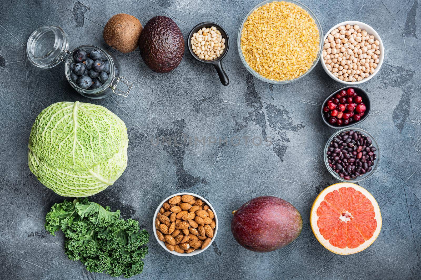 Healthy diet eating and meal planning, frame or border concept, flat lay with space for text, on grey background.
