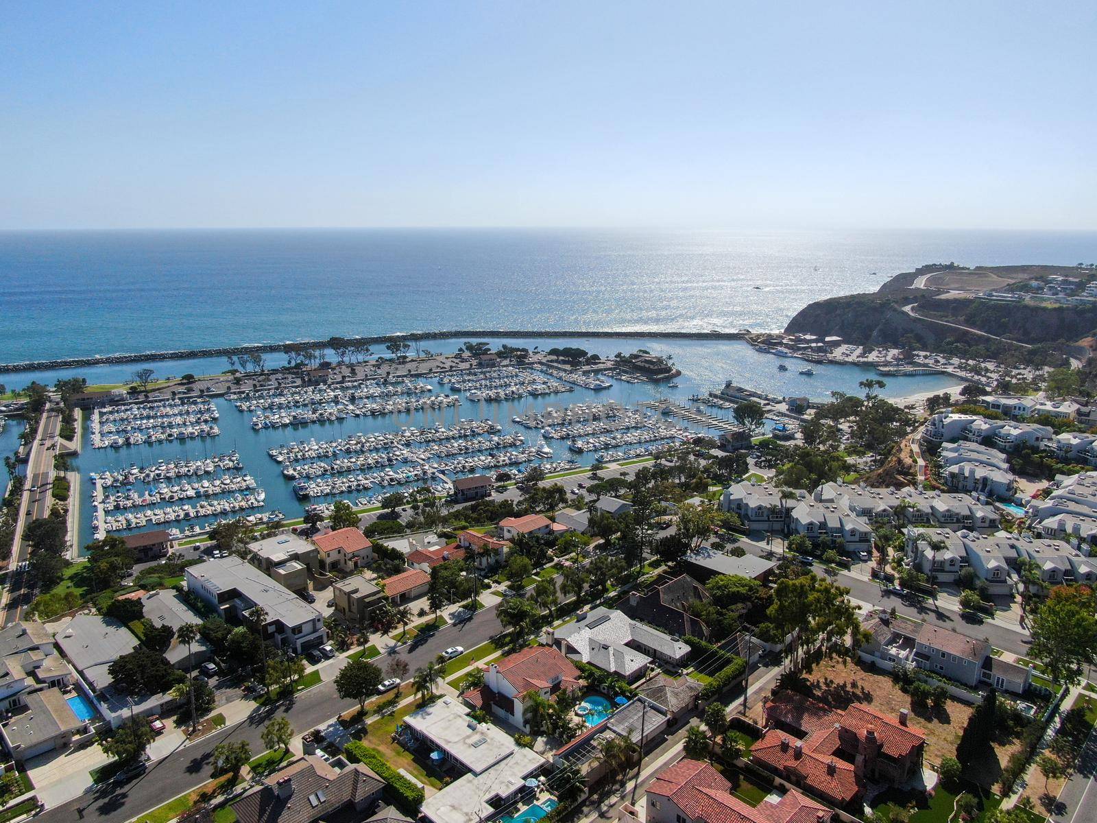 Aerial view of Dana Point Harbor town and beach. Southern Orange County, California. USA