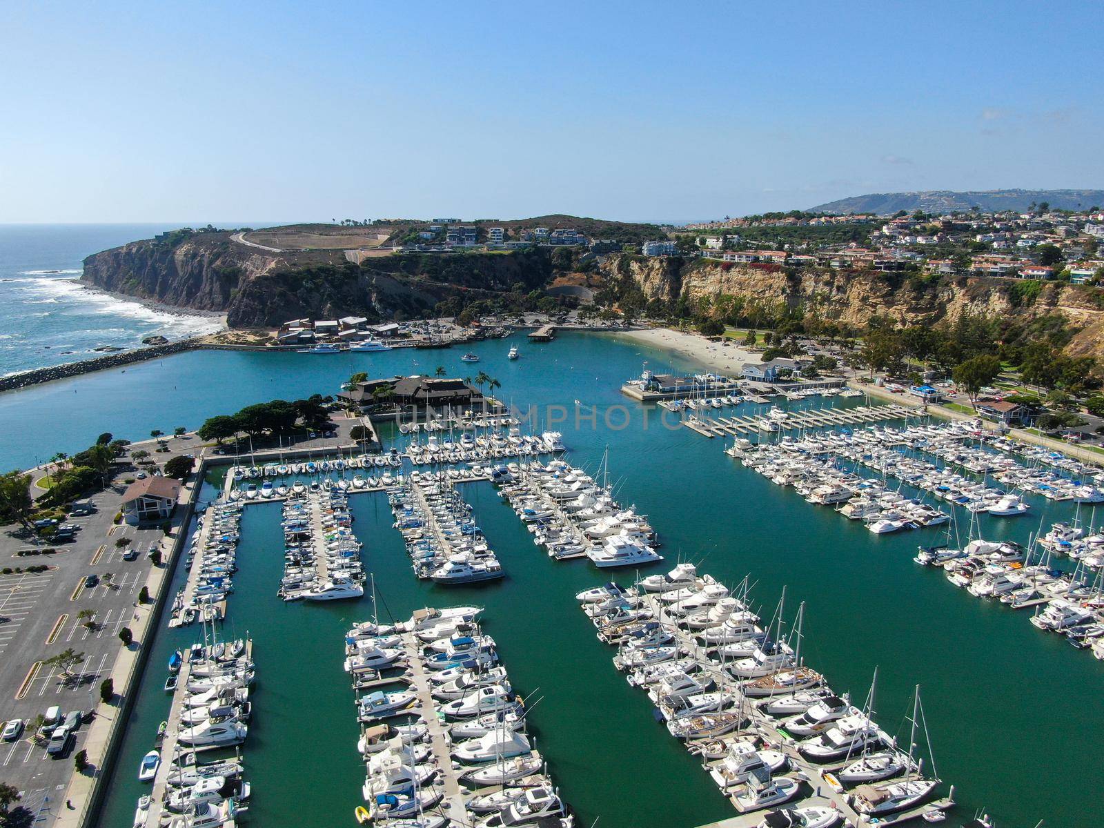 Aerial view of Dana Point Harbor and her marina with yacht and sailboat. southern Orange County, California. USA