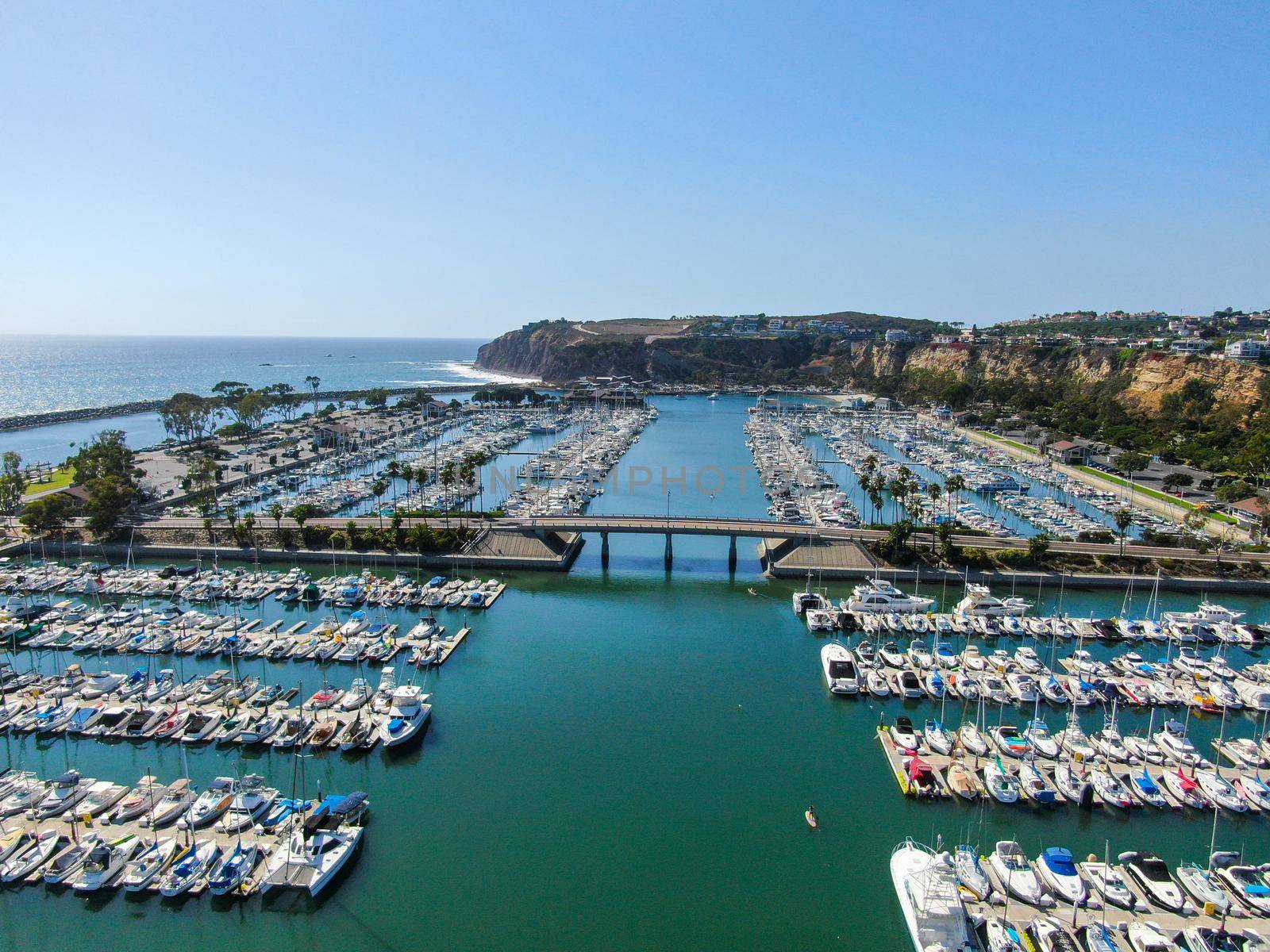 Aerial view of Dana Point Harbor and her marina with yacht and sailboat. southern Orange County, California. USA