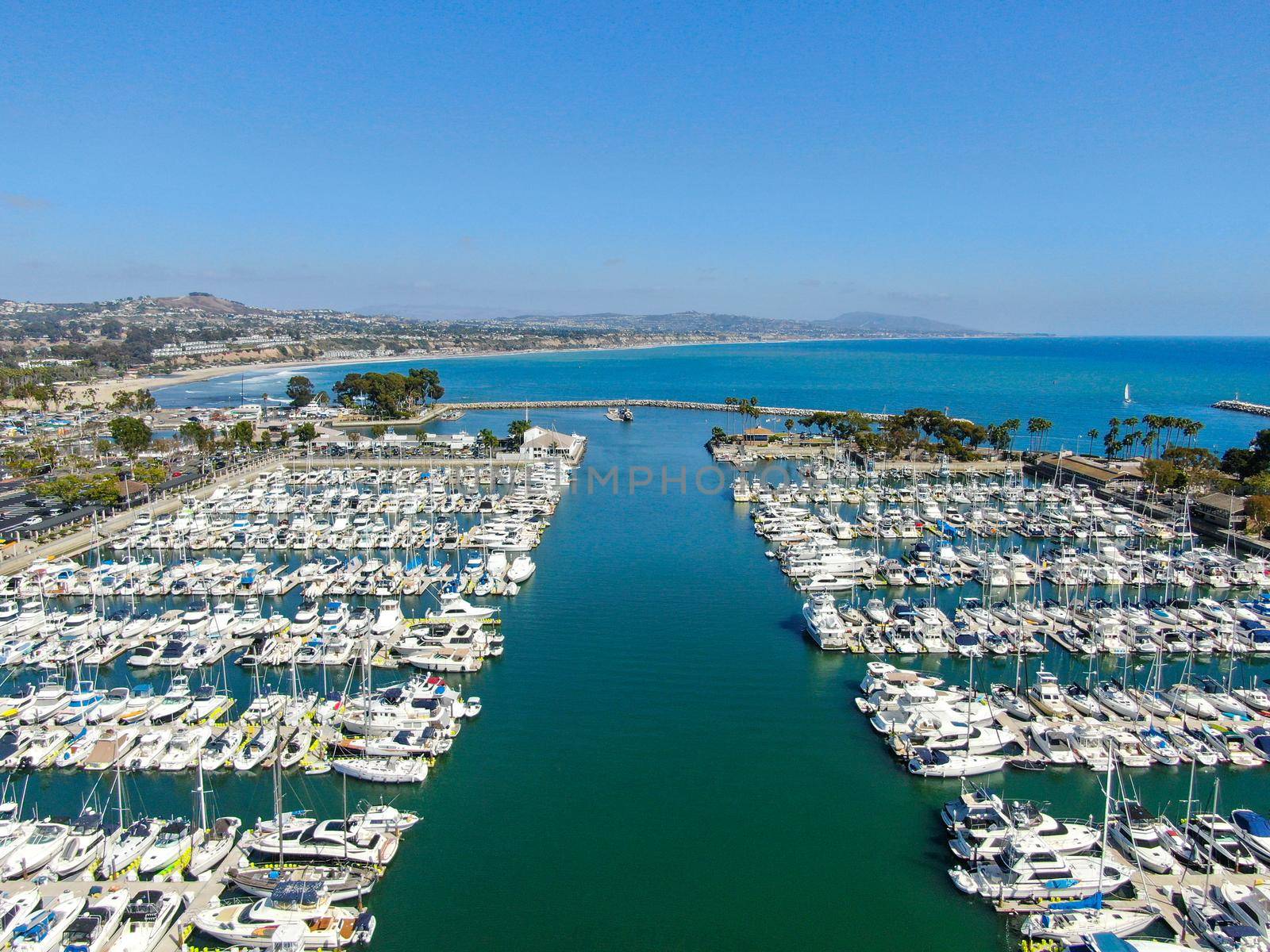 Aerial view of Dana Point Harbor and her marina with yacht and sailboat. southern Orange County, California. USA