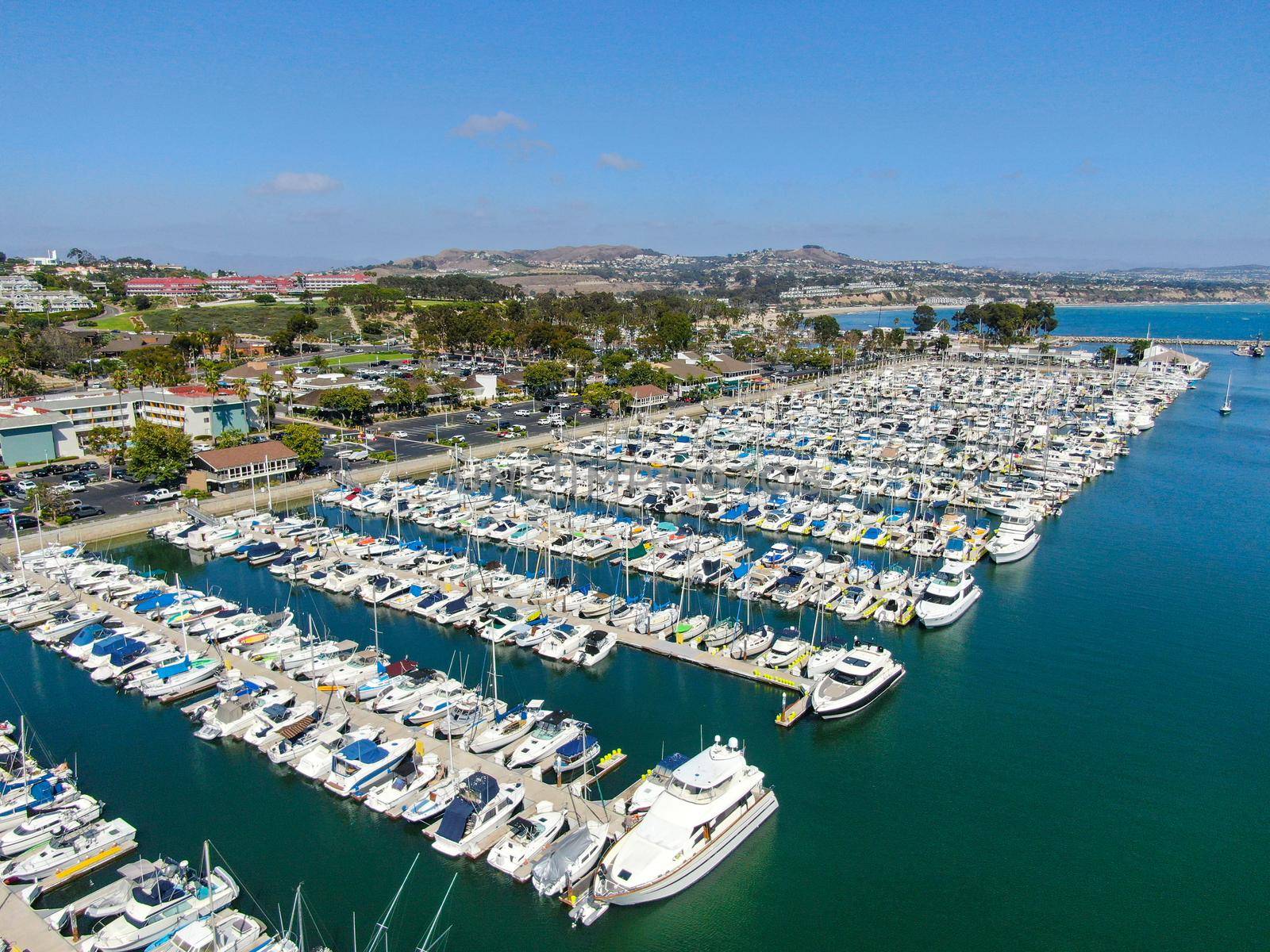 Aerial view of Dana Point Harbor and her marina with yacht and sailboat. southern Orange County, California. USA