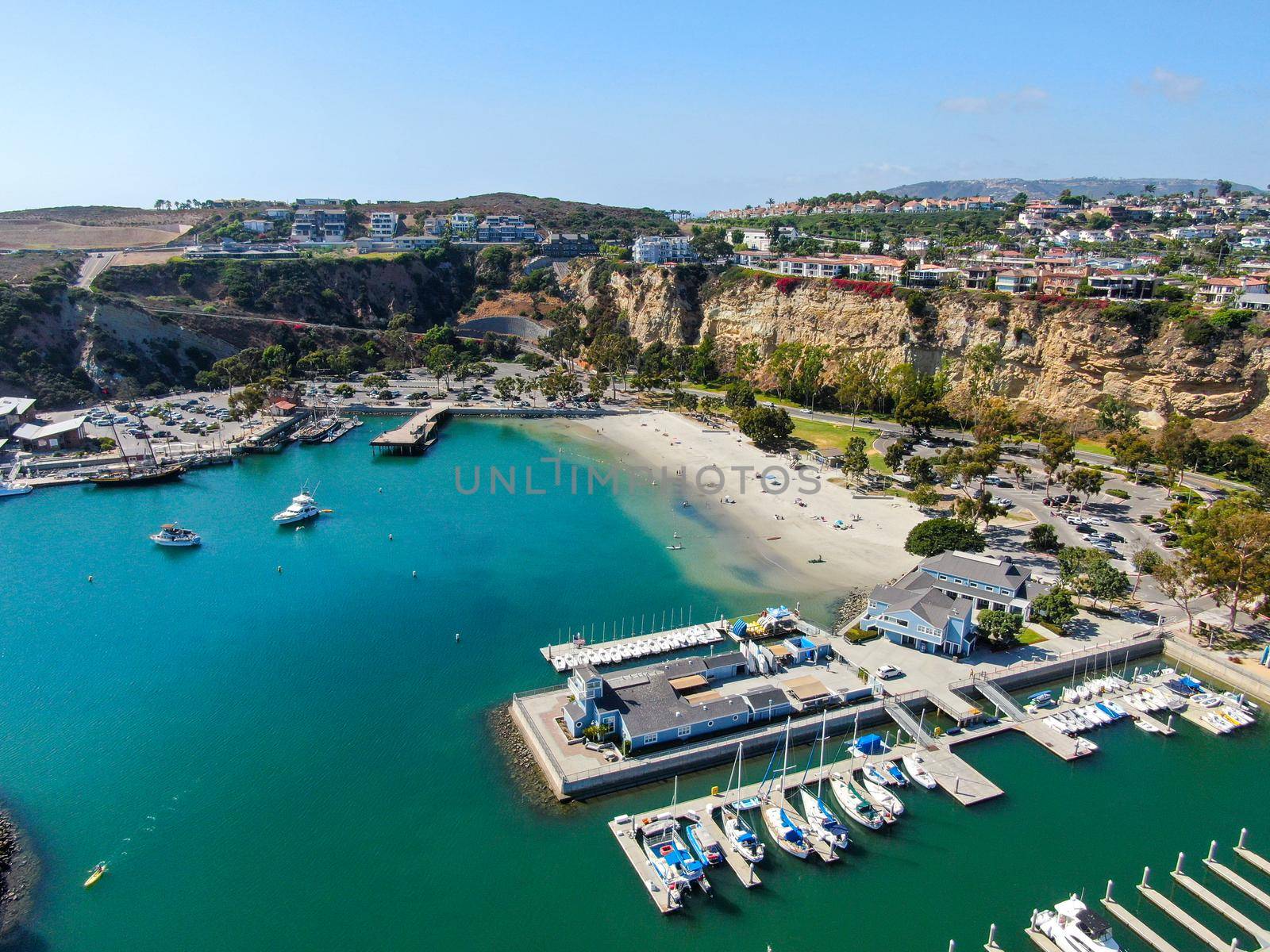 Aerial view of Dana Point Harbor town and beach. Southern Orange County, California. USA