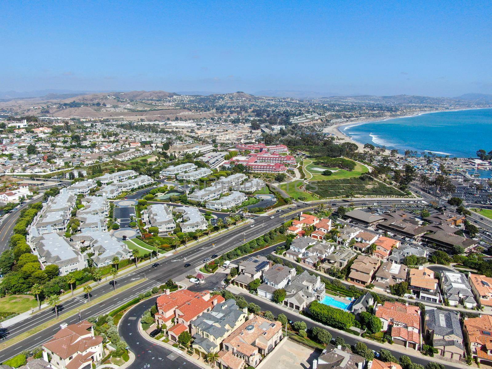 Aerial view of Dana Point Harbor town and beach. Southern Orange County, California. USA