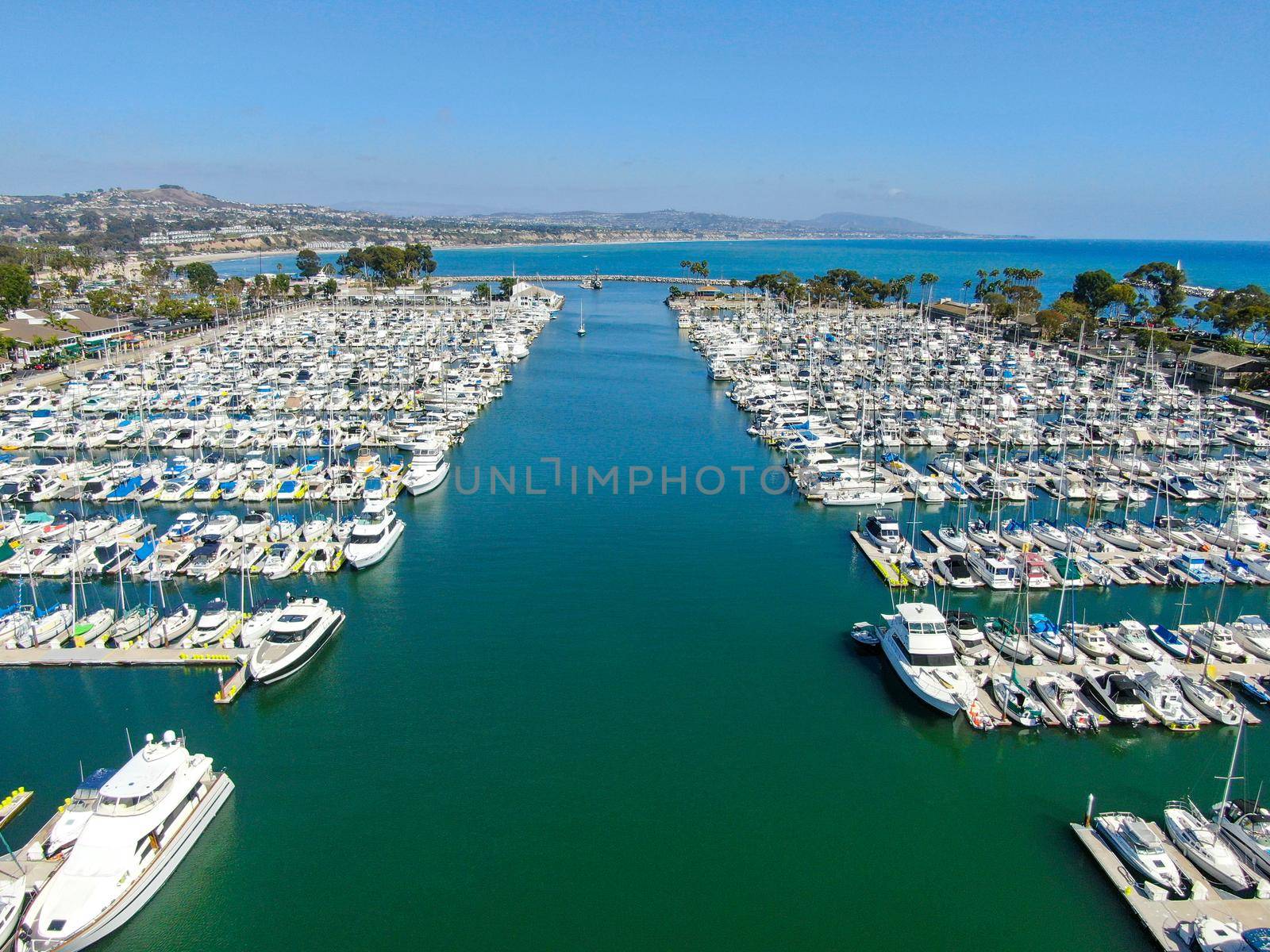 Aerial view of Dana Point Harbor and her marina with yacht and sailboat. southern Orange County, California. USA