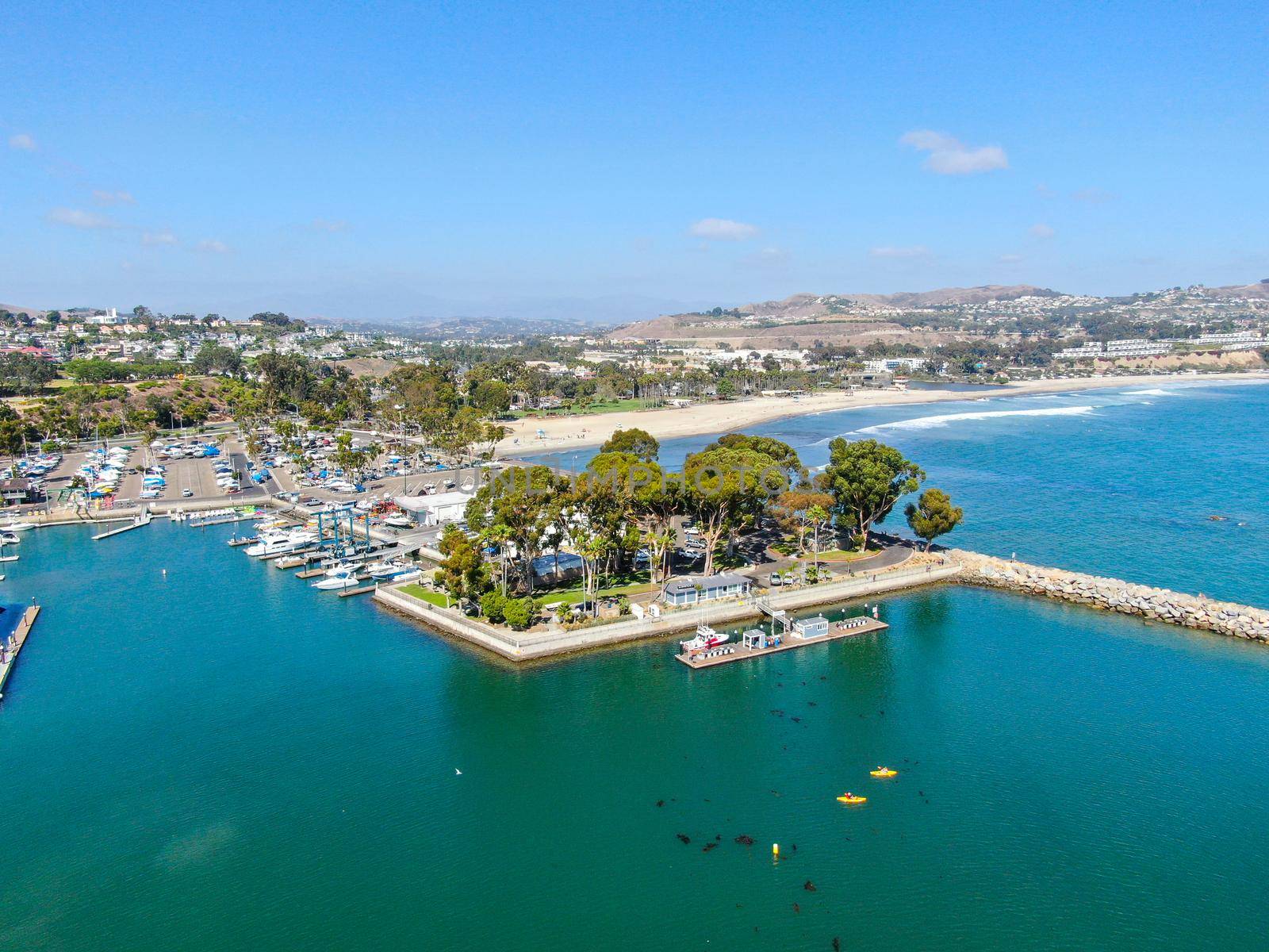 Aerial view of Dana Point Harbor town and beach. Southern Orange County, California. USA