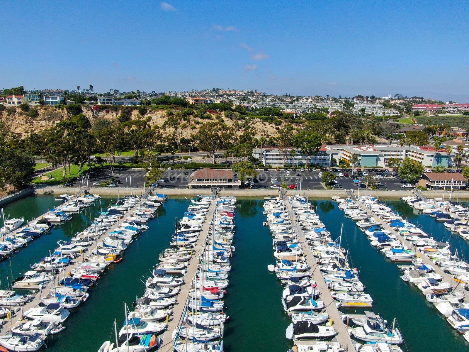 Aerial view of Dana Point Harbor and her marina with yacht and sailboat. southern Orange County, California. USA