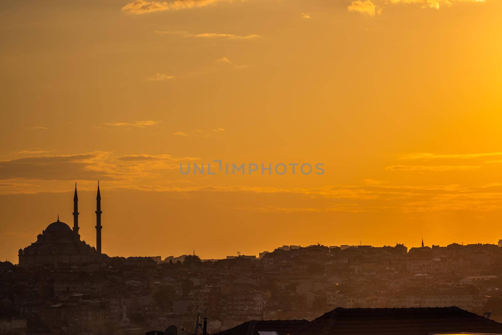 Istanbul sunset skyline panoramic view of Istanbul Turkey. Beautiful Bosphorus with mosques at the background.