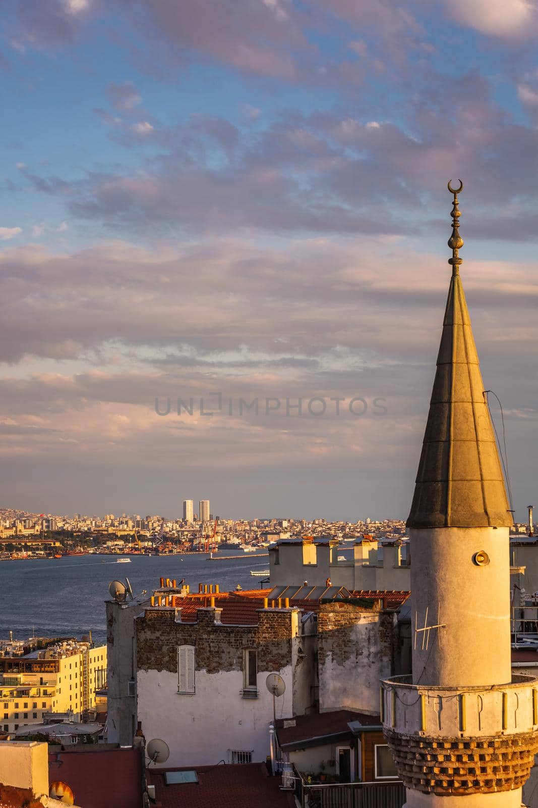 Istanbul sunset skyline panoramic view of Istanbul Turkey. Beautiful Bosphorus with mosques at the background.