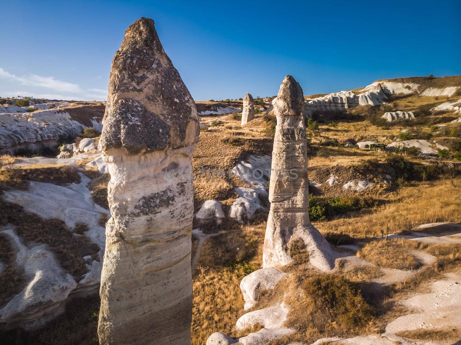 Aerial drone view of the fairy chimney landscape in Love Valley of Cappadocia in Goreme, Turkey.