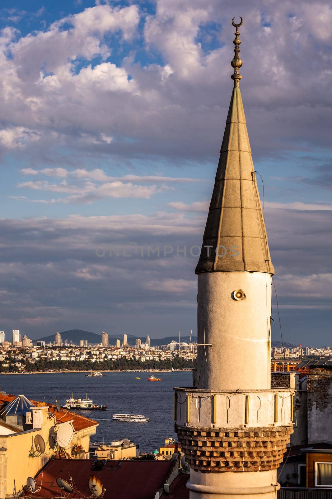 Istanbul sunset skyline panoramic view of Istanbul Turkey. Beautiful Bosphorus with mosques at the background.
