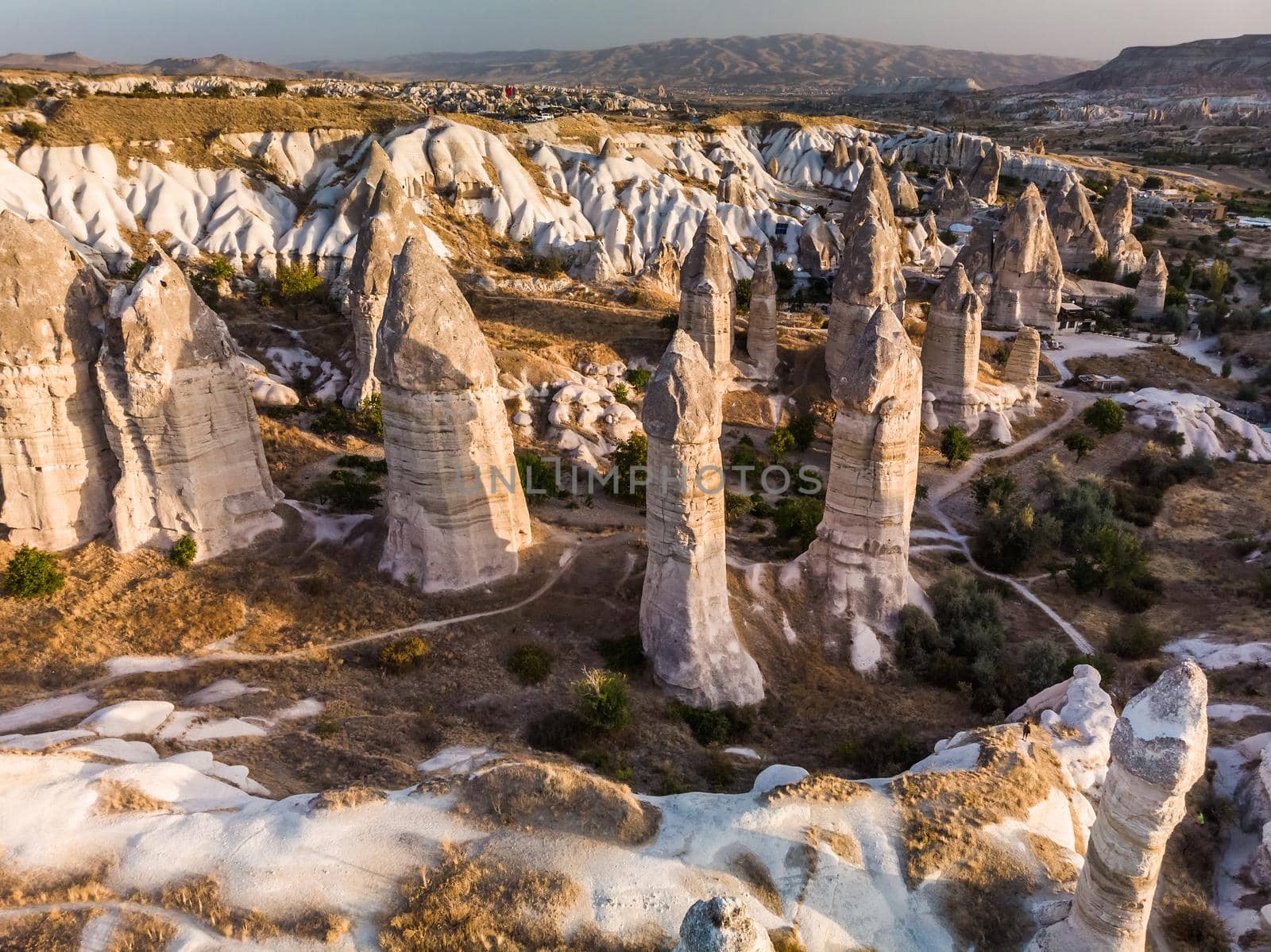 Aerial drone view of the fairy chimney landscape in Love Valley of Cappadocia in Goreme, Turkey.