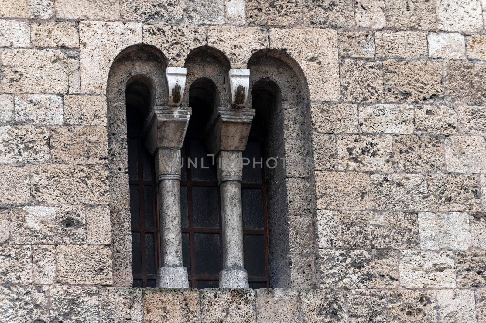 architectural detail of a church window in Terni